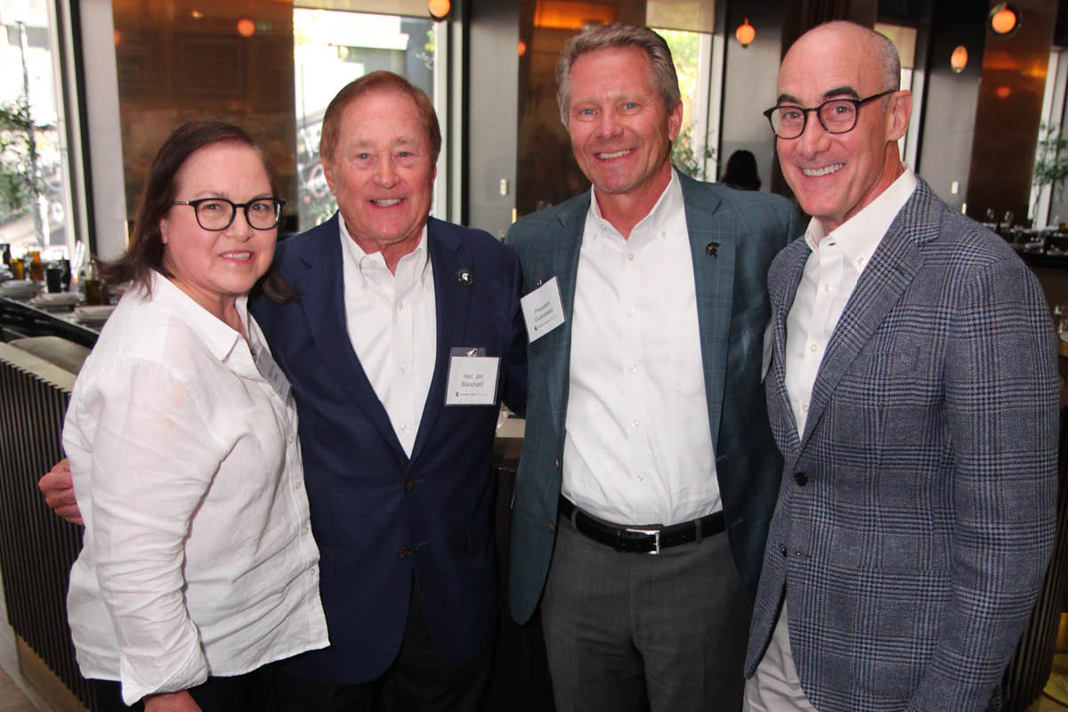 Robert and Renee Greening stand with former Michigan governor and Canadian ambassador Jim Blanchard and MSU President Kevin Guskiewicz during a recent event in Toronto, Ontario.