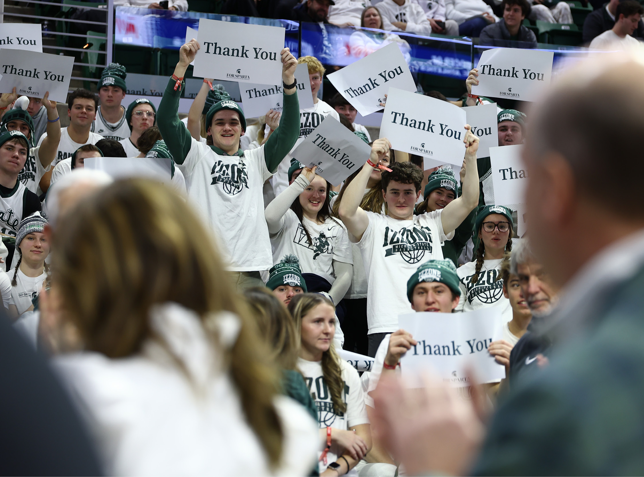 Students in the Izzone hold 
