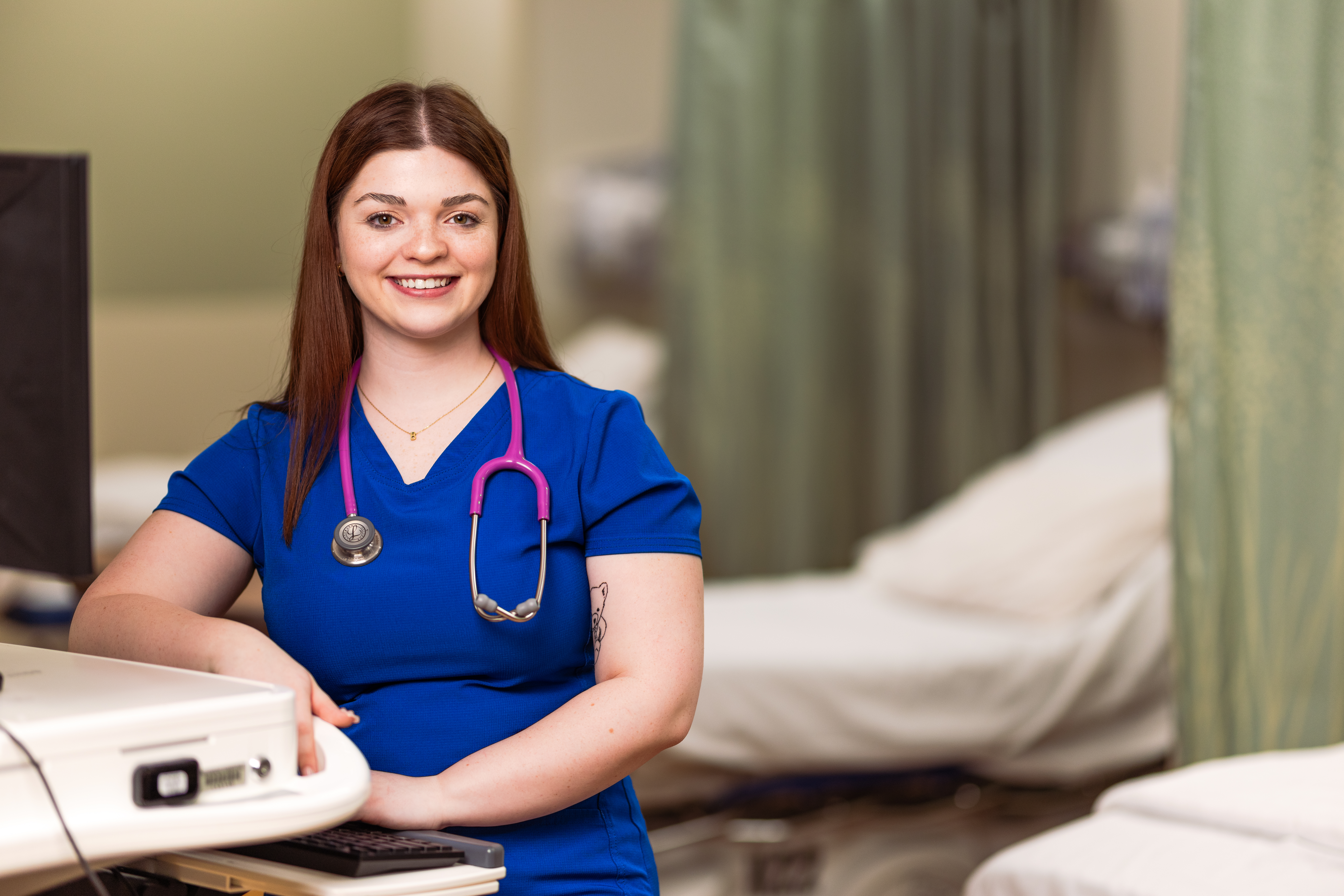 A professional photo of Bella Hilden at work as a patient care technician.