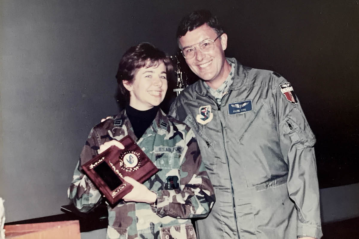 MSU alumna Constance Laflamme receives the Strategic Air Command Company Grade Officer of the Year award alongside her commanding officer Colonel Stephen Pohl.