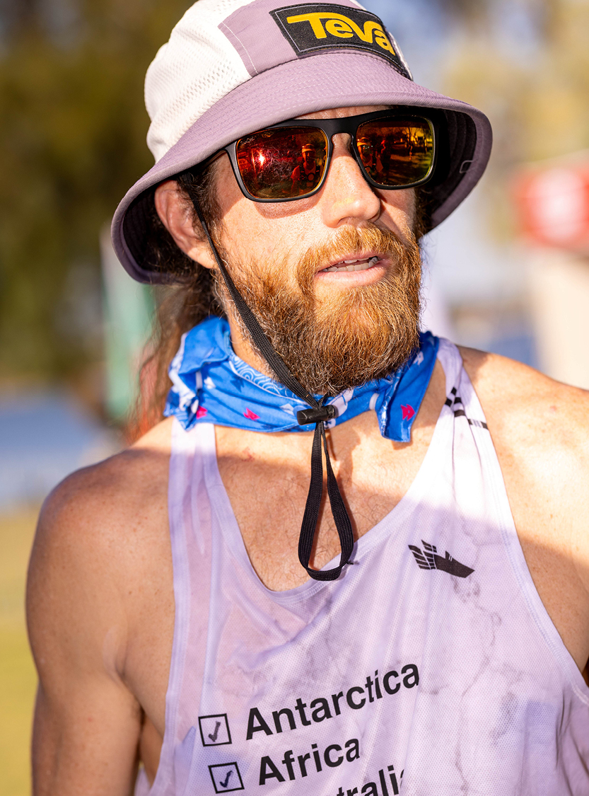 Mike Wardian after a race wearing a hat and sunglasses. 