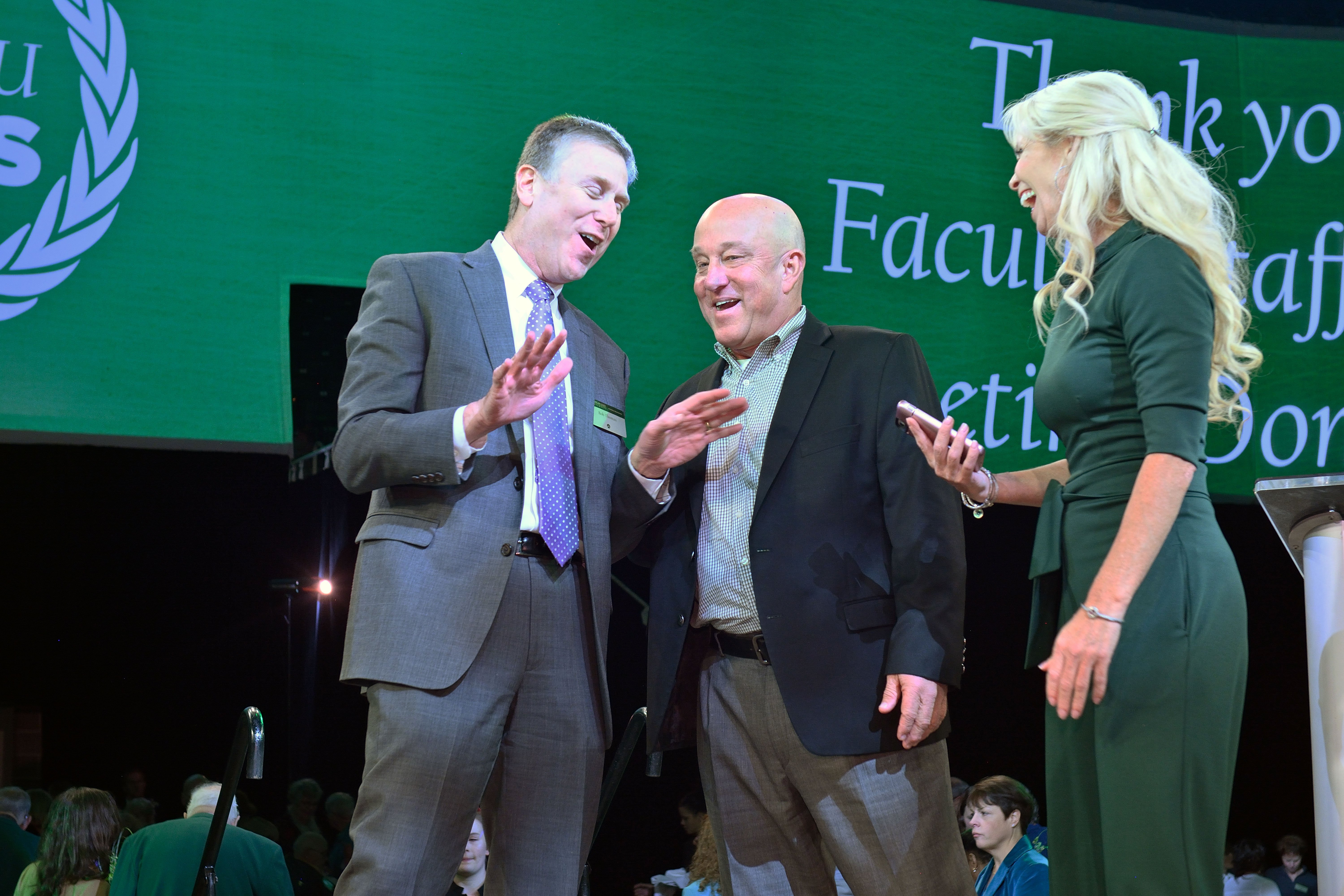 Assistant Vice President Bob Thomas with Glen Brough and Suzy Merchant