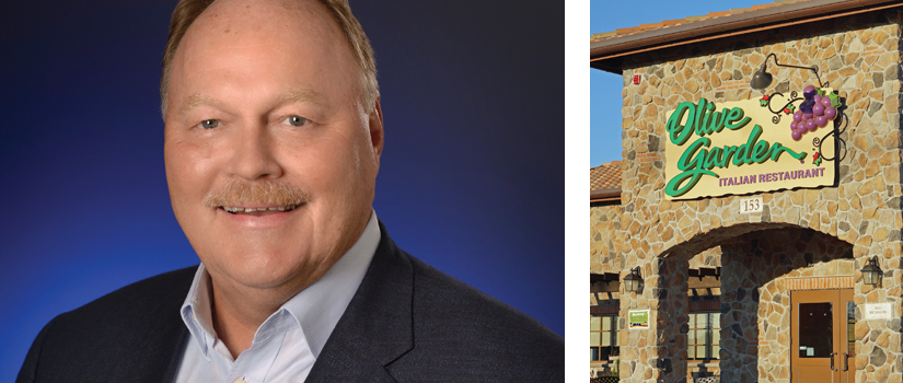 Dave George and front of Olive Garden Restaurant