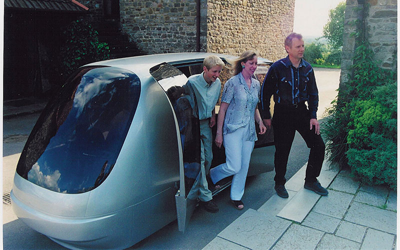 people getting out of autonomous vehicle