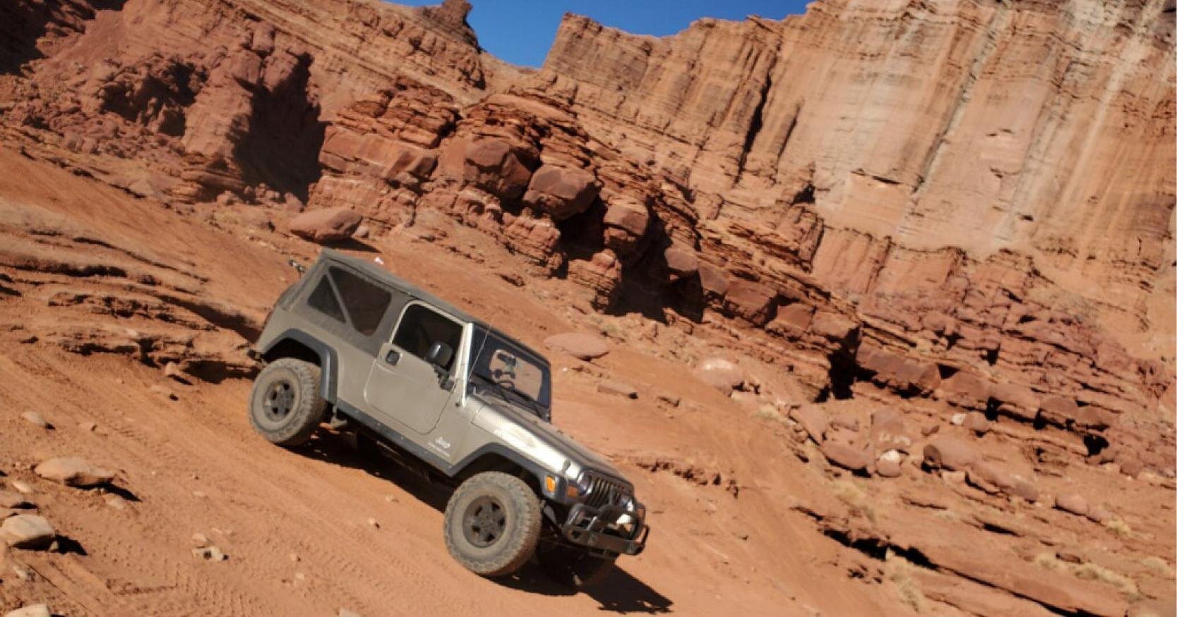 jeep trudges through offroad trail