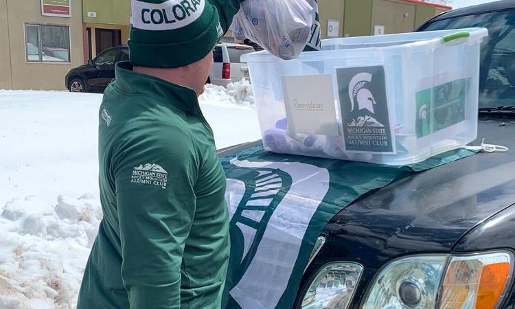Colorado Spartan collecting items for a drive