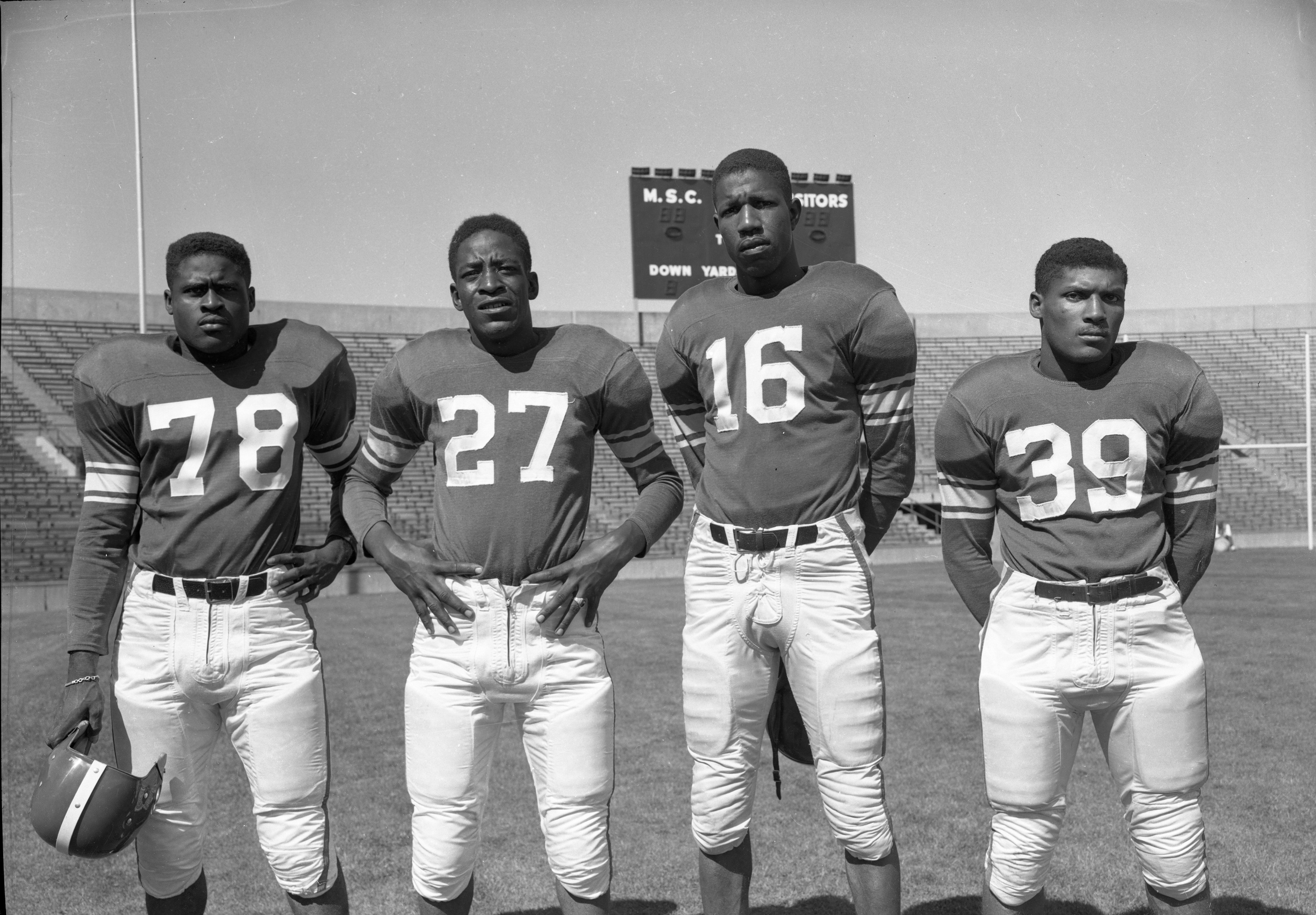 Spartans in uniform, Sept. 1951. #78 Donald Coleman, #27 Willie Thrower, #16 Arthur Ingram, #39 Leroy Bolden.