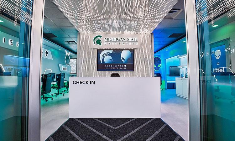 A check-in desk is located at the entrance to the E sports lounge.