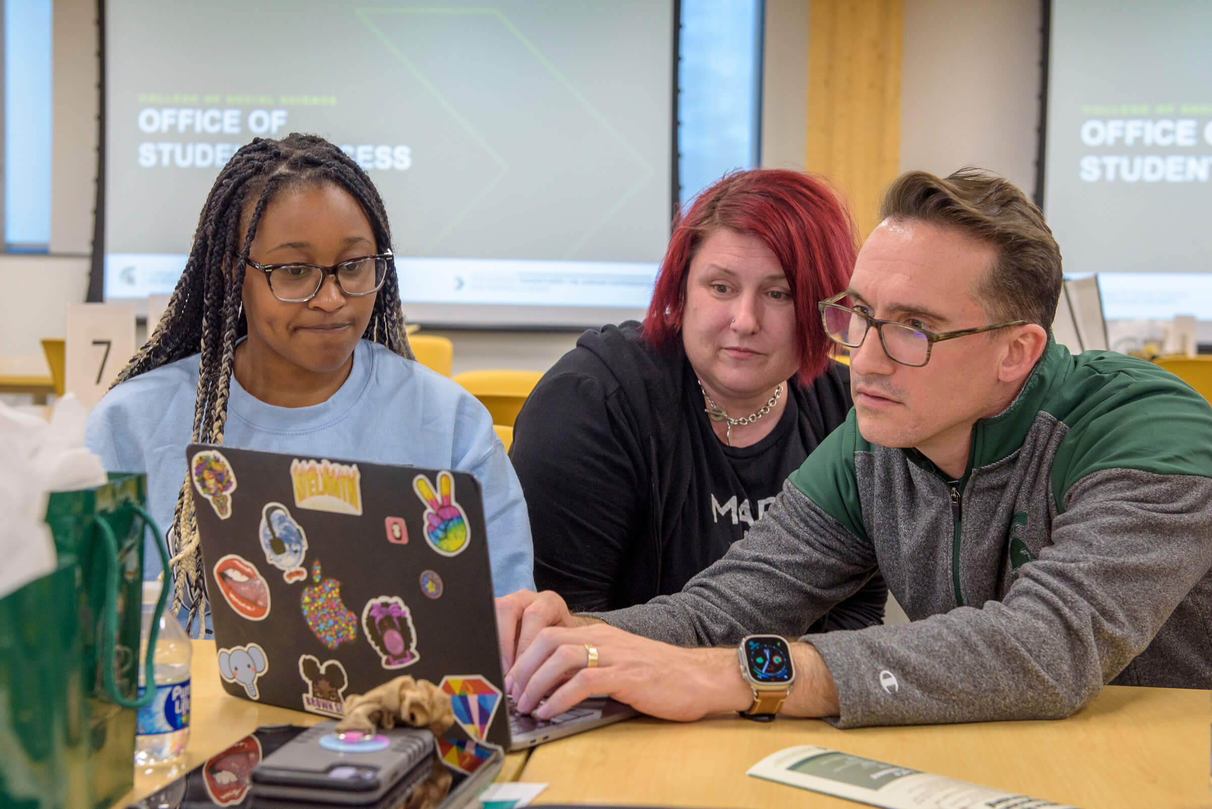 A student receives assistance at the study night that the Transfer Student Success Center partnered with the College of Social Science to host. It was on April 26 at the STEM Teaching and Learning Facility.