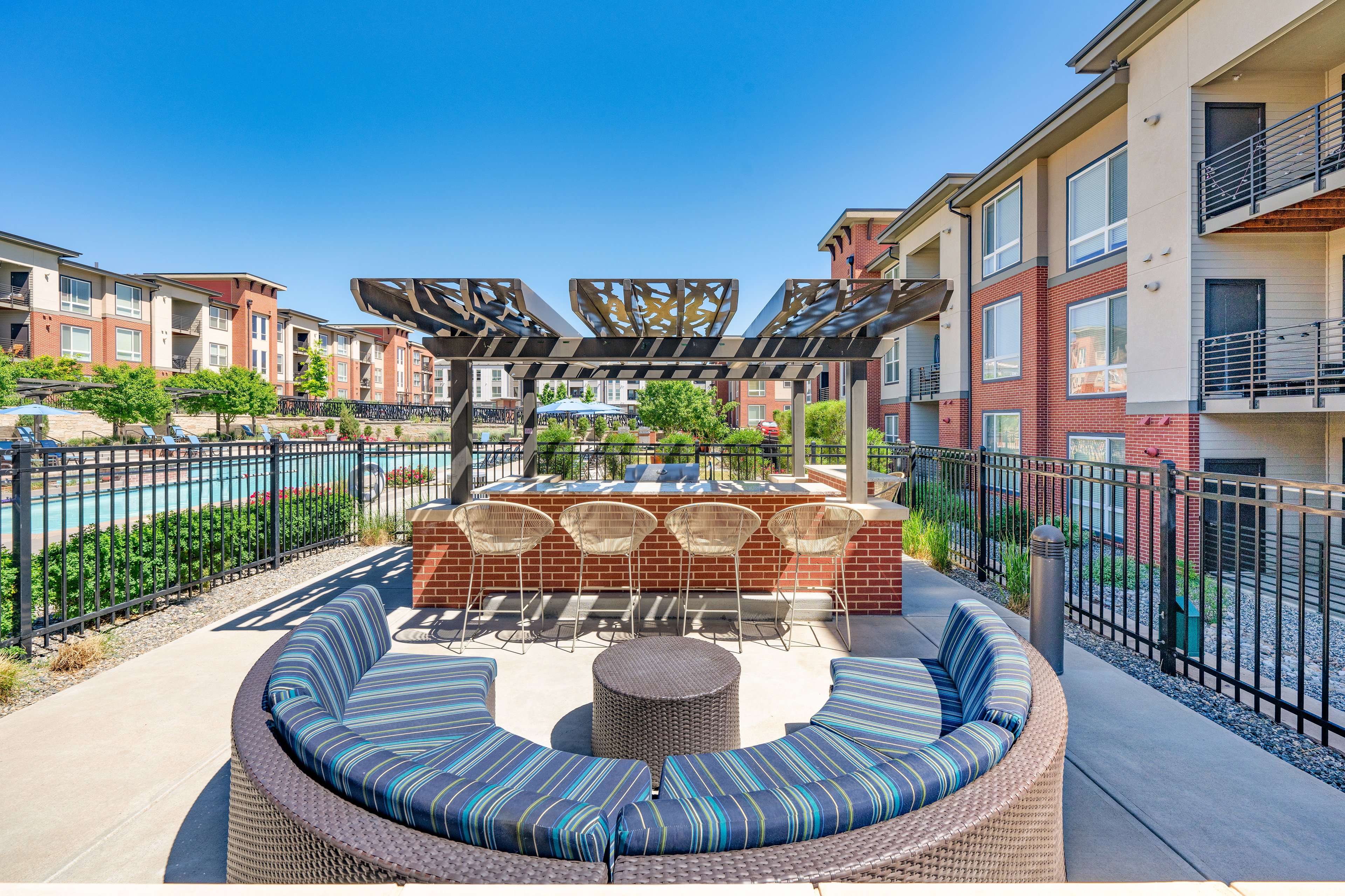 Pool grilling at MAA Promenade luxury apartment homes in Westminster, CO