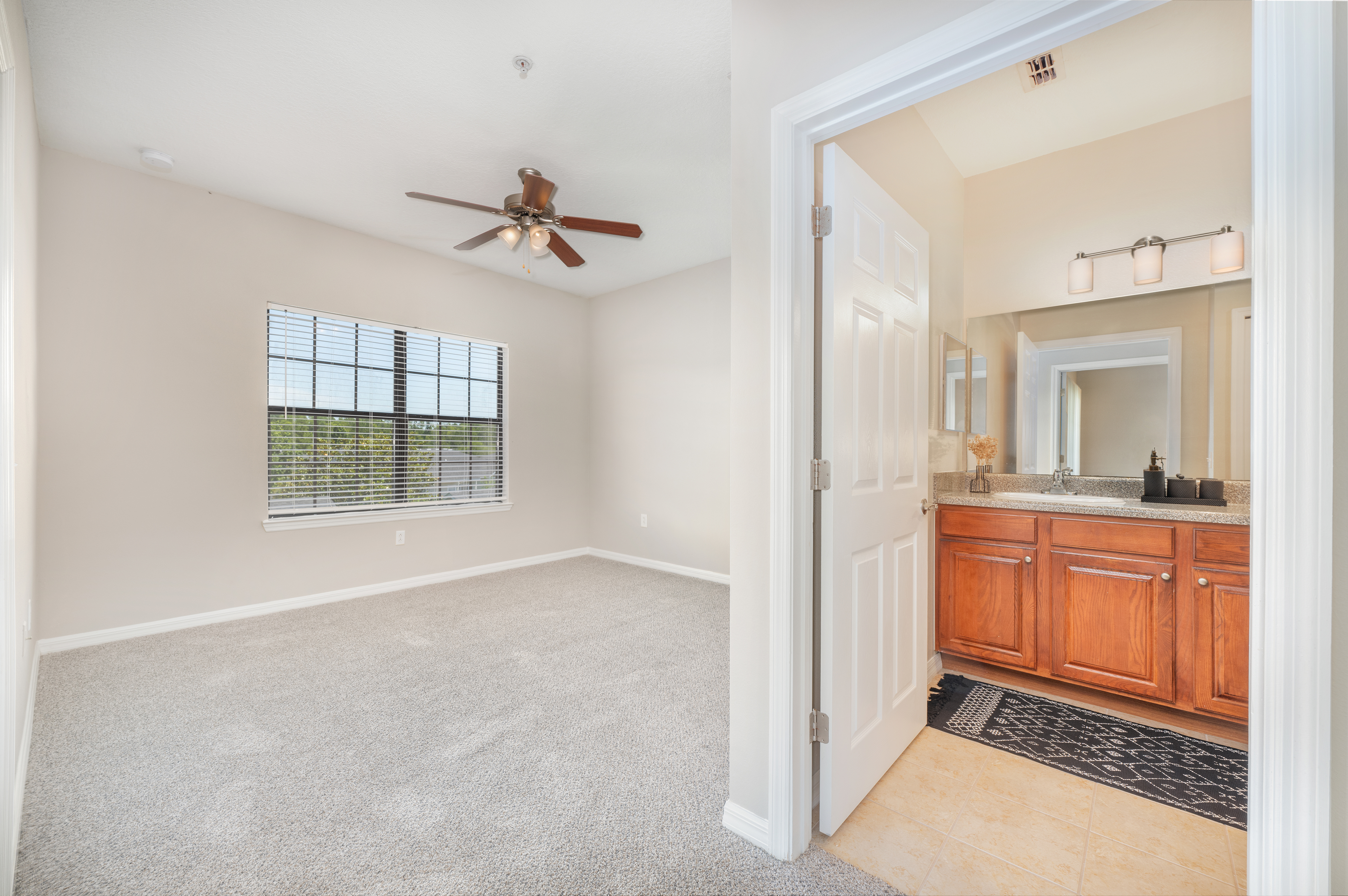 Bedroom at MAA Magnolia Parke luxury apartment homes in Gainesville, FL