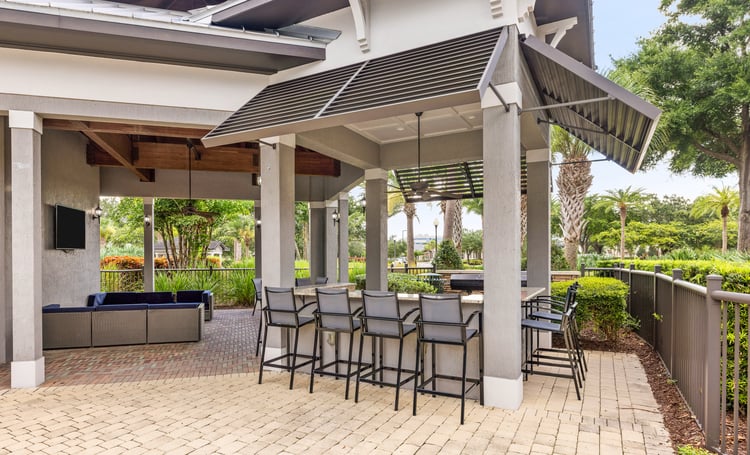 Pool lounge at MAA Lake Mary luxury apartment homes in Lake Mary, FL