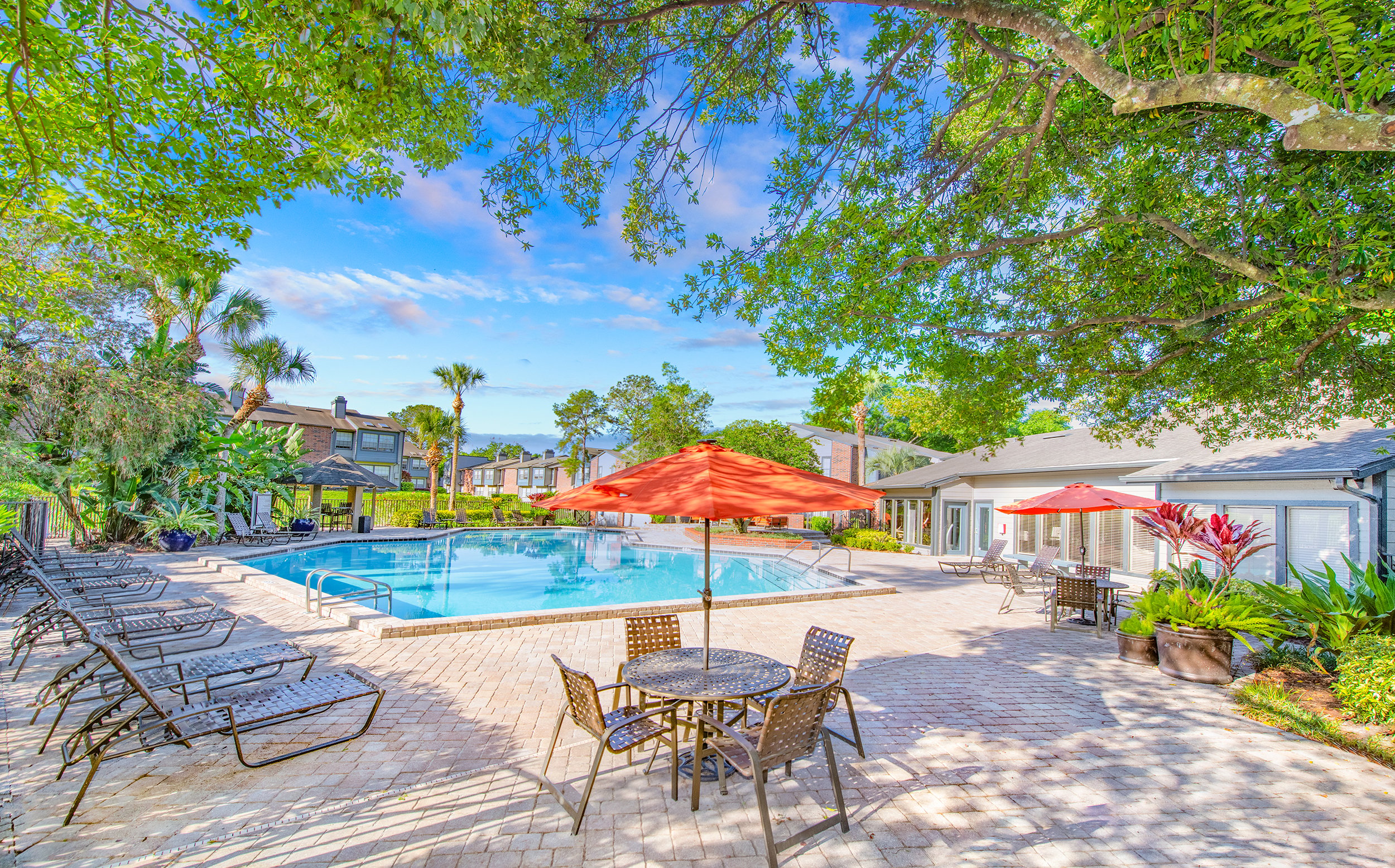 Pool at MAA Tiffany Oaks luxury apartment homes in Orlando , FL
