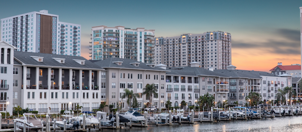 Exterior Over Water at Night at MAA Harbour Island luxury apartment homes in Tampa, FL