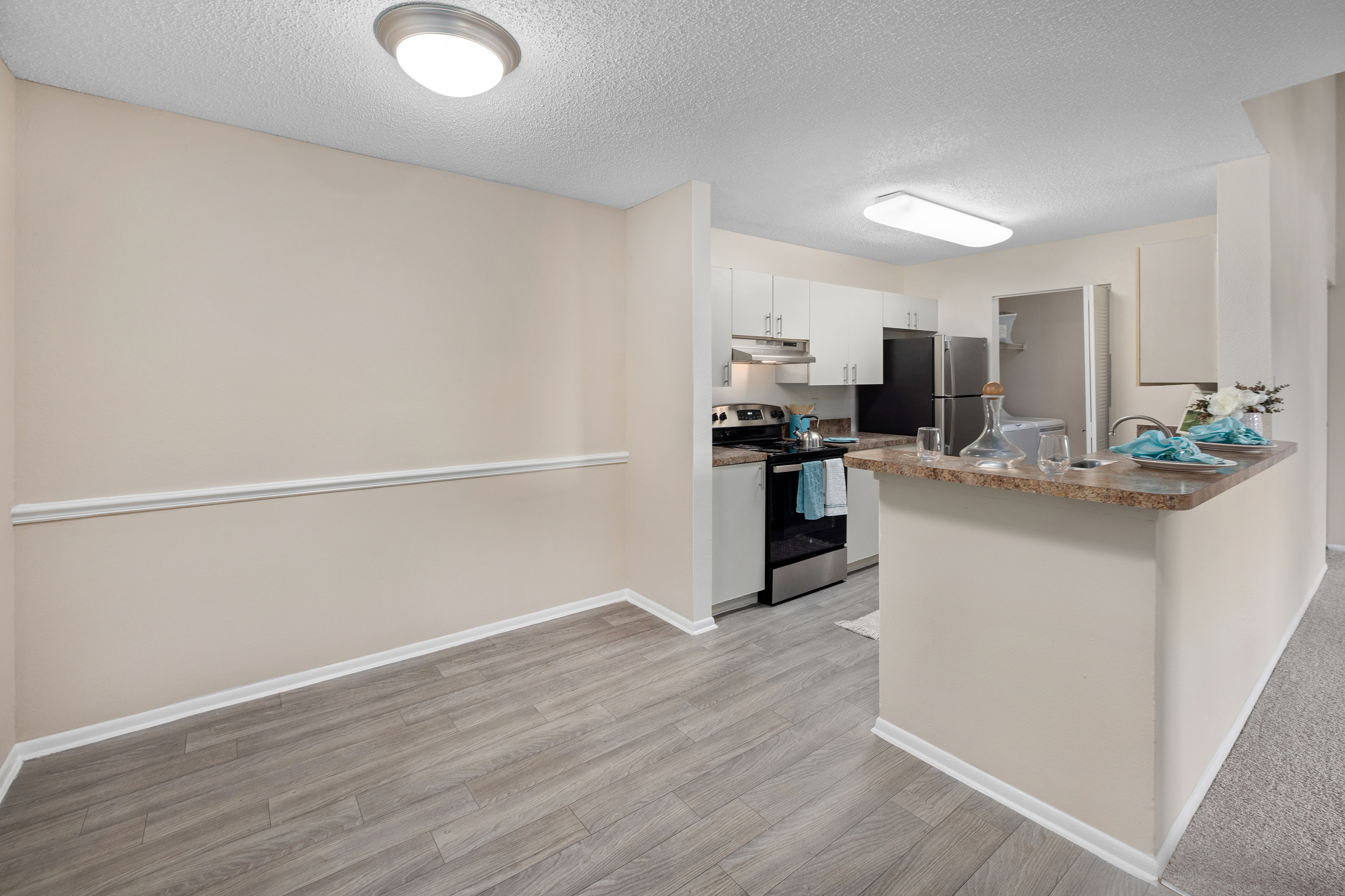 Model - Kitchen dining area -  at MAA Indigo Park luxury apartment homes in Tampa, FL