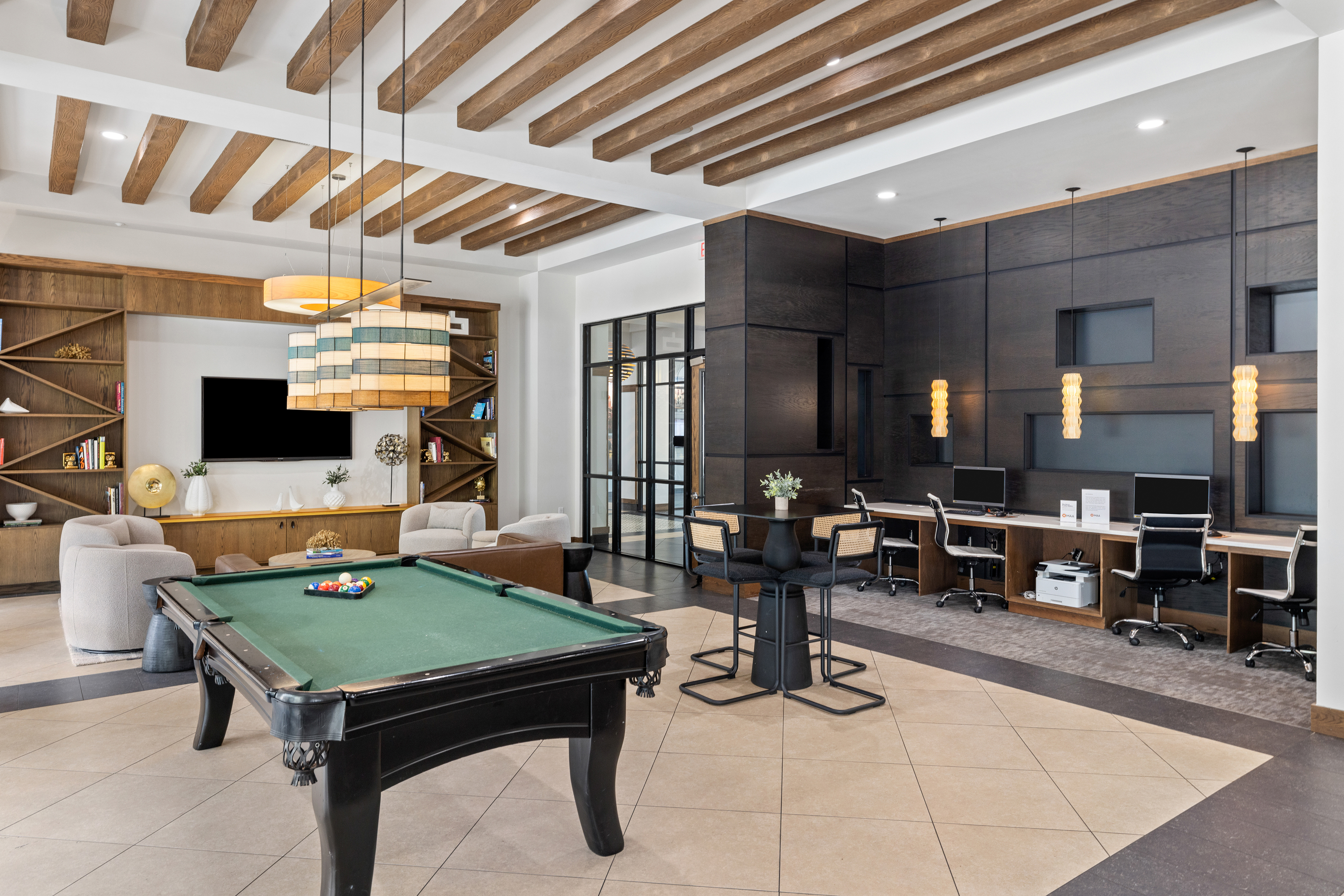 Lounge- pool table -  at MAA SoHo Square luxury apartment homes in Tampa, FL