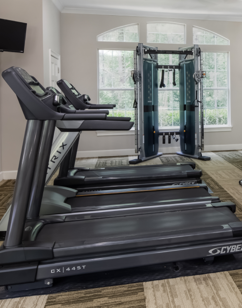 State-of-the-art fitness center with treadmills and weight machines at MAA Barrett Creek luxury apartments in Marietta, GA