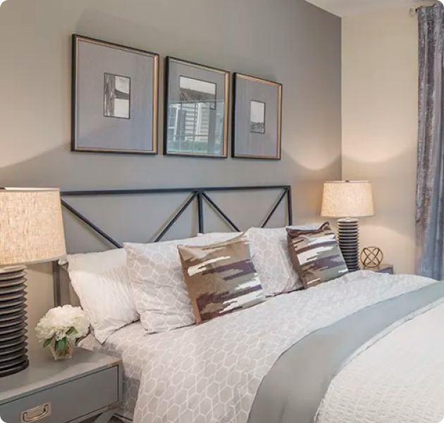 Model bedroom with modern-style furniture at MAA Briarcliff luxury apartments in Atlanta, GA