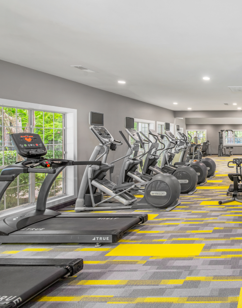 State-of-the-art fitness center with treadmills and elliptical machines at MAA Brookhaven luxury apartments in Atlanta, GA