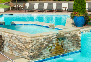 Pool with a soaking tub and water falls at MAA Brookhaven luxury apartments in Atlanta, GA