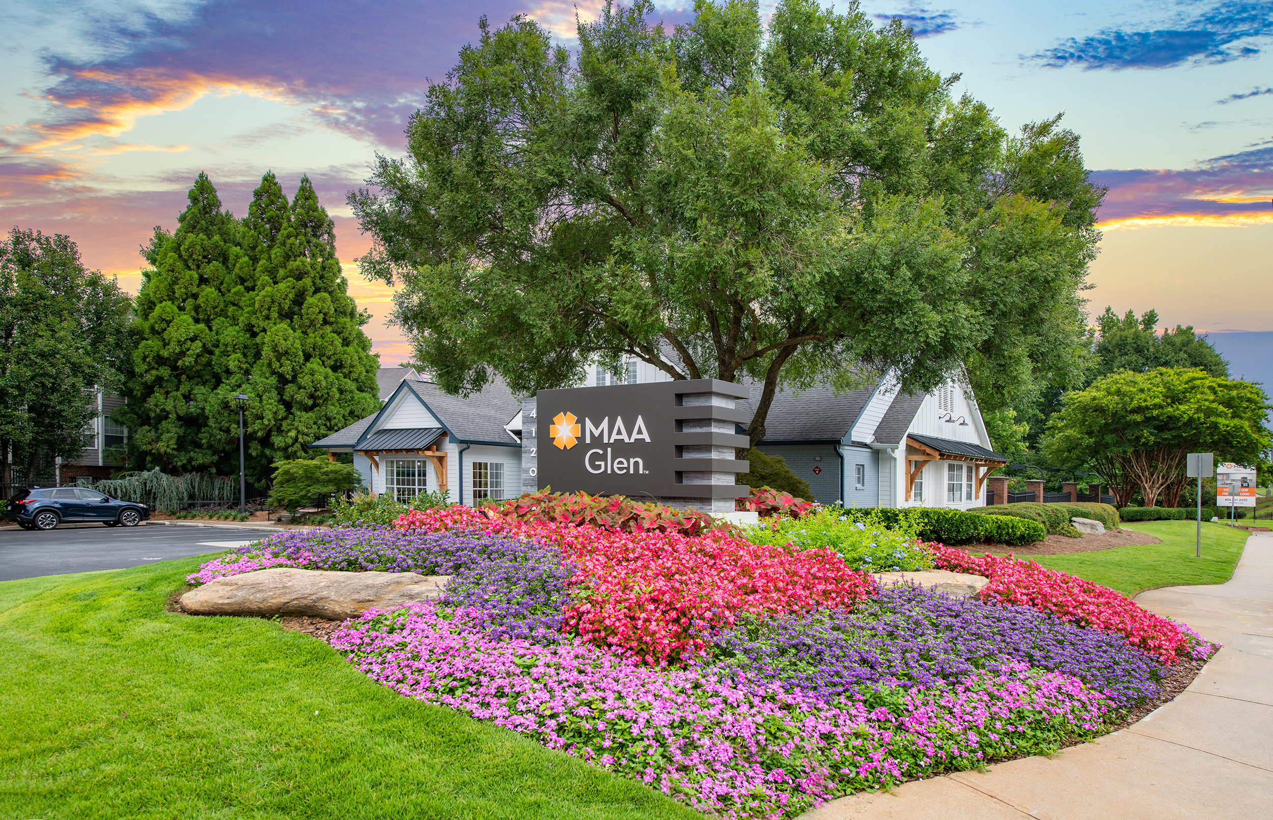 MAA Glen exterior signage with flower bushes in Atlanta, GA 