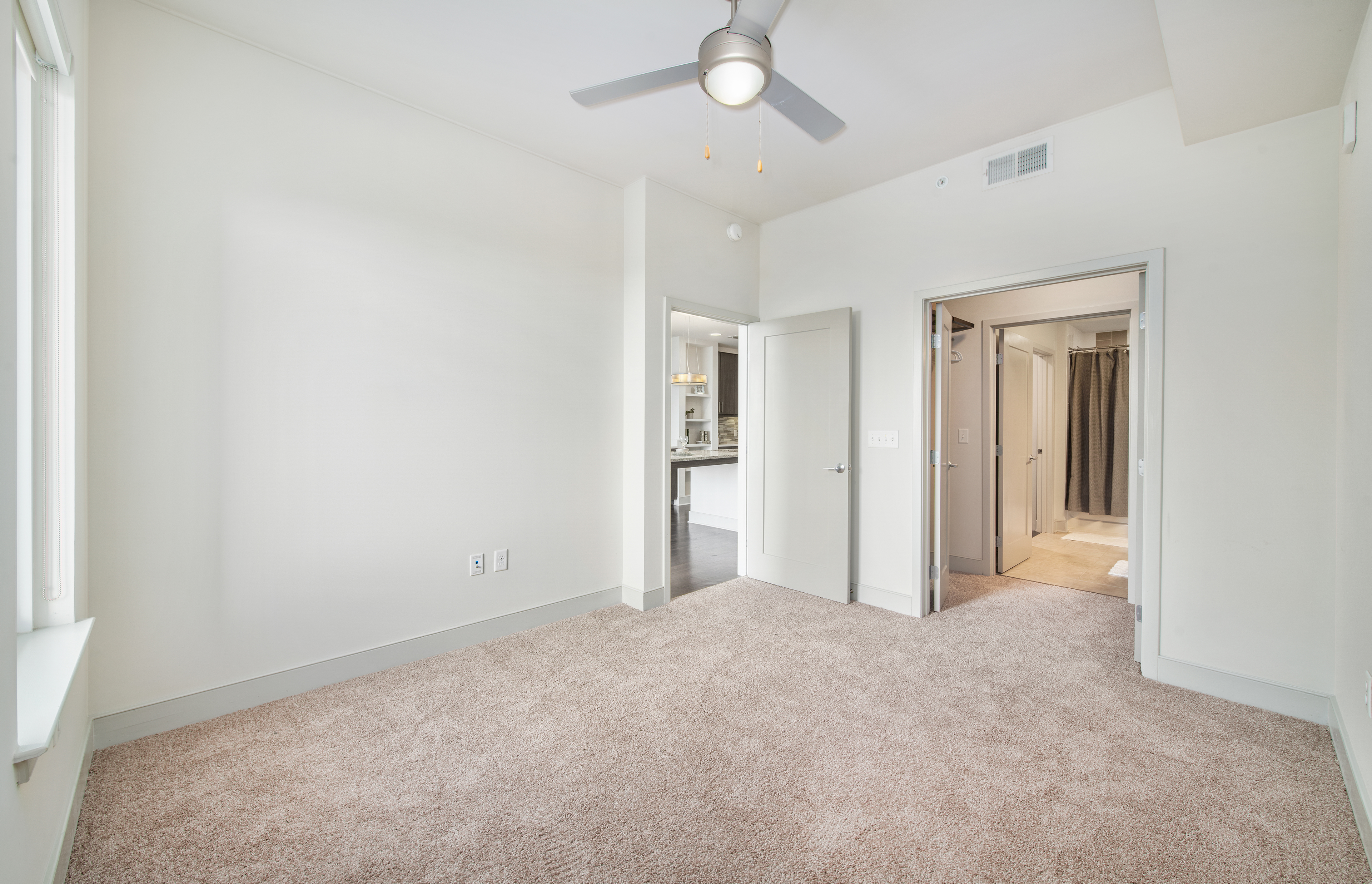 Empty bedroom of a property at MAA Lenox luxury apartments in Atlanta, GA