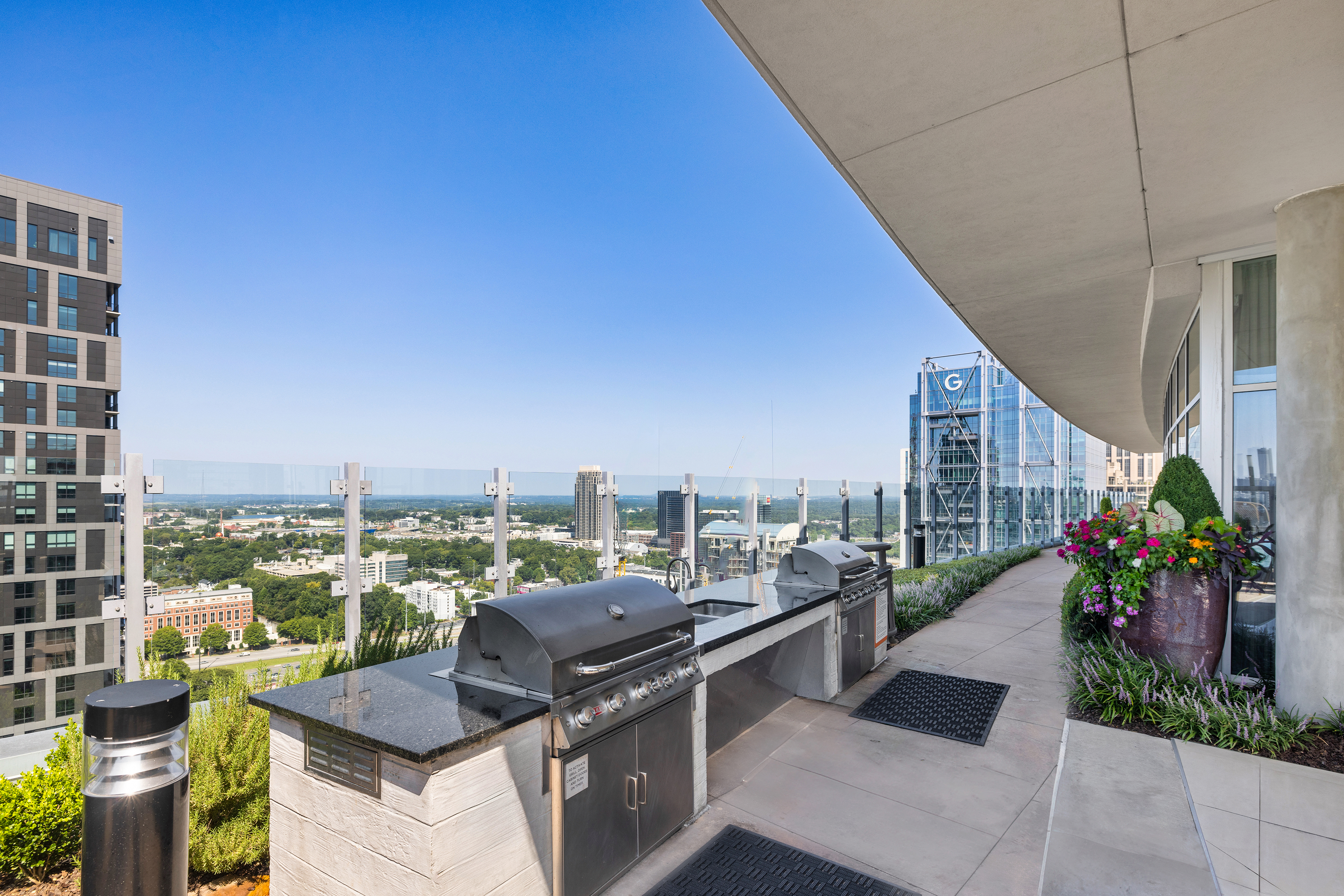 Rooftop grilling at MAA Midtown luxury apartment homes in Atlanta, GA