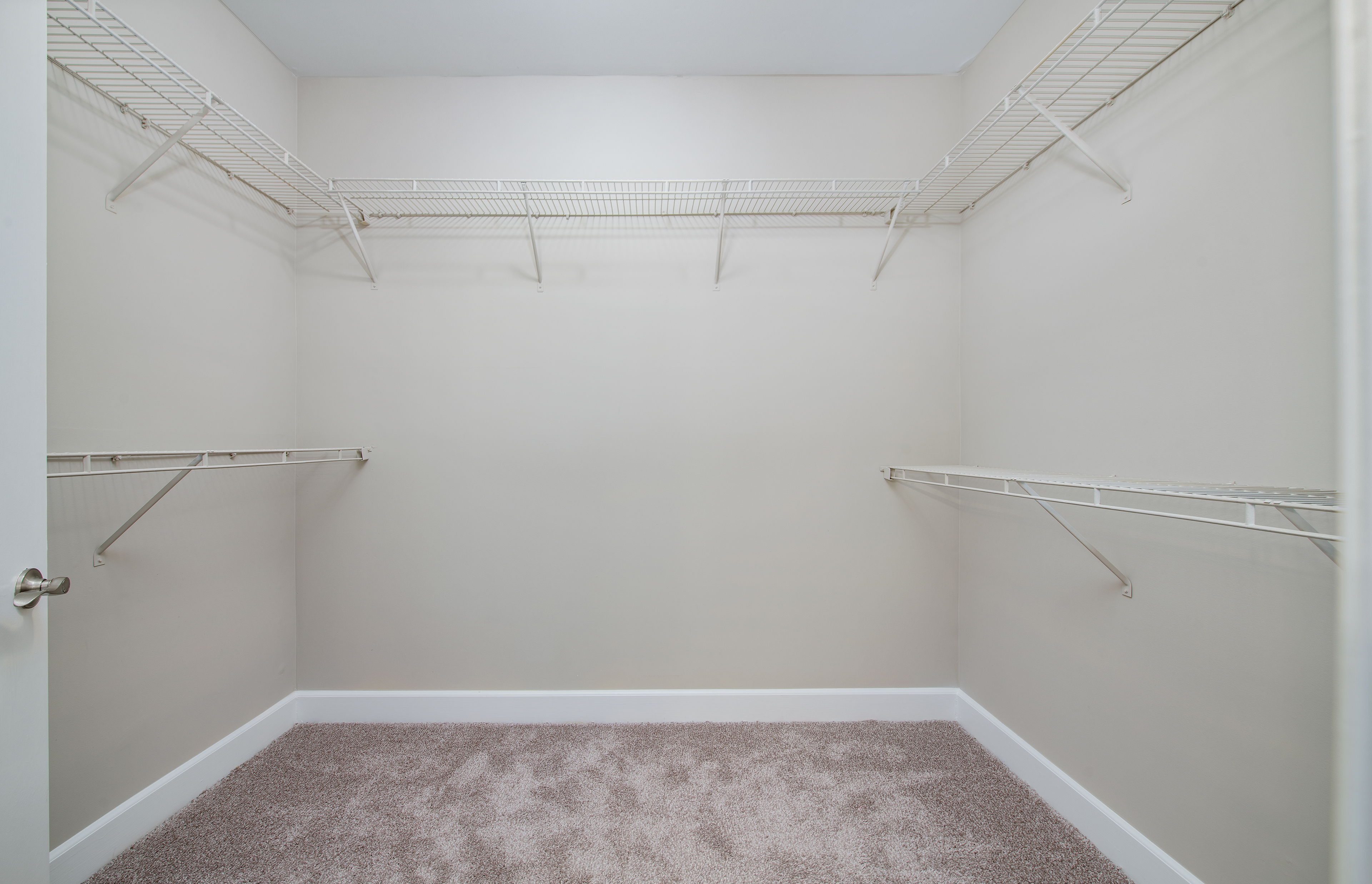 Empty closet space in unit at MAA West Village luxury apartments in Smyrna, GA