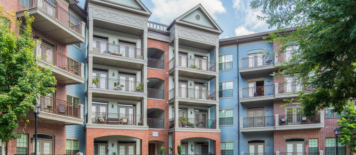 Exterior view of units with balconies at MAA West Village luxury apartments in Smyrna, GA