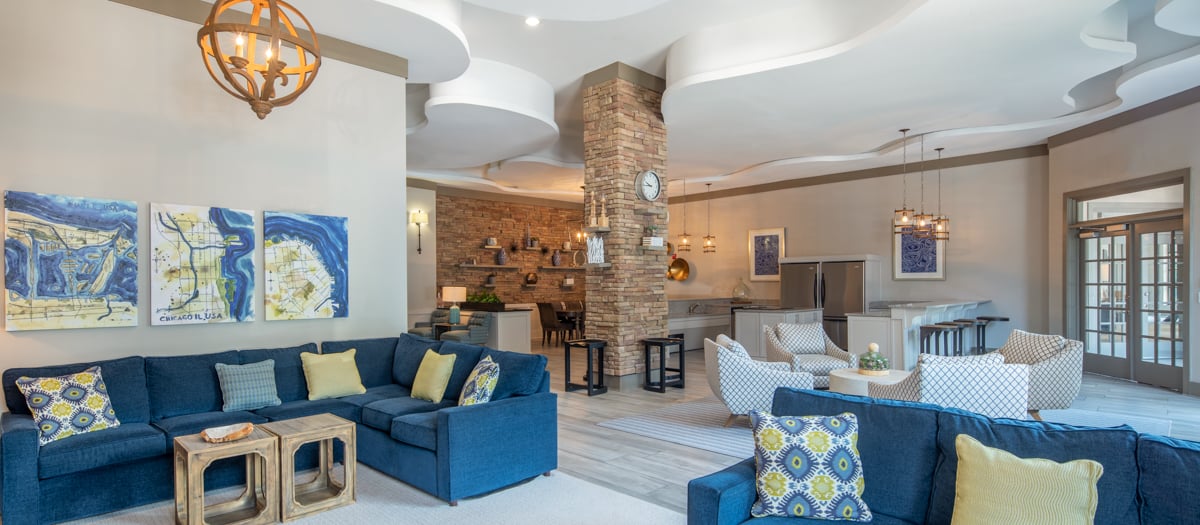 Community clubhouse with lounge areas at MAA West Village luxury apartments in Smyrna, GA