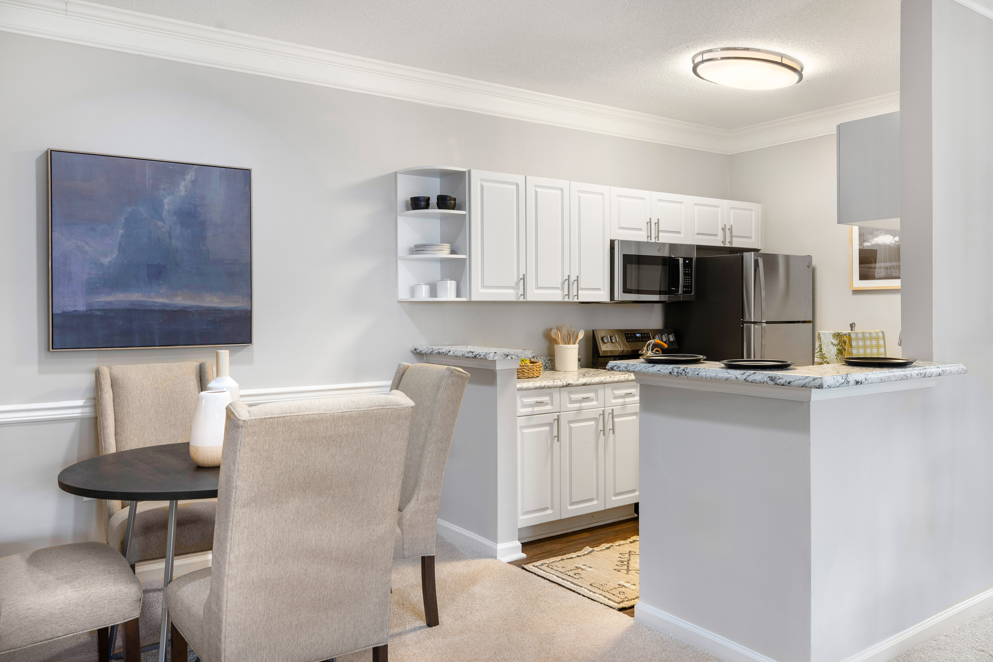 Model - Kitchen and Dining area -  at MAA City Grand luxury apartment homes in Charlotte, NC