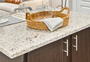 Close up of kitchen counter serving tray with dark cabinets at MAA Gateway luxury apartments in Charlotte, NC