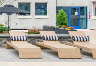 Close up of poolside lounge chairs at MAA Gateway luxury apartments in Charlotte, NC