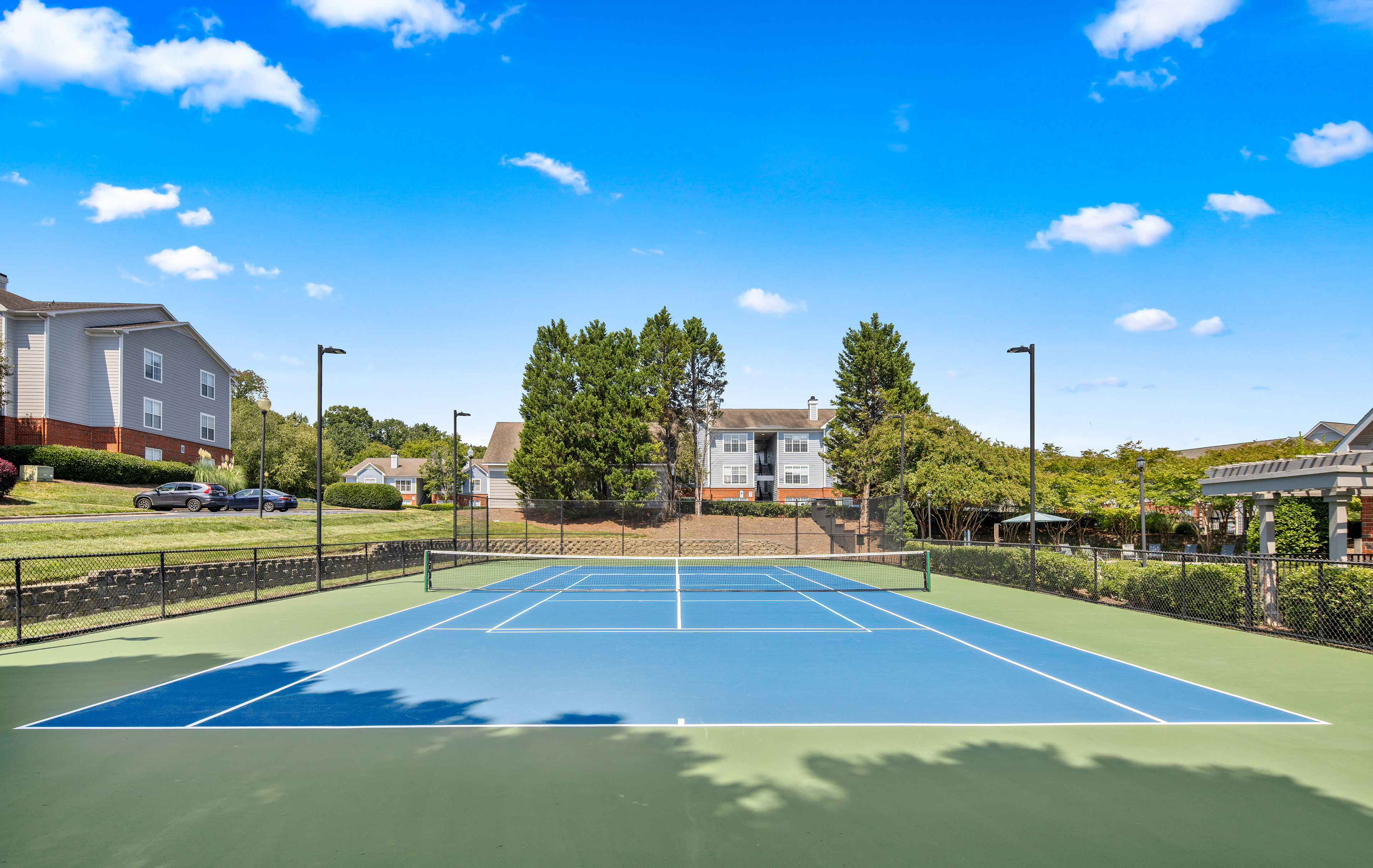Tennis Court  -  at MAA University Lake luxury apartment homes in Charlotte, NC