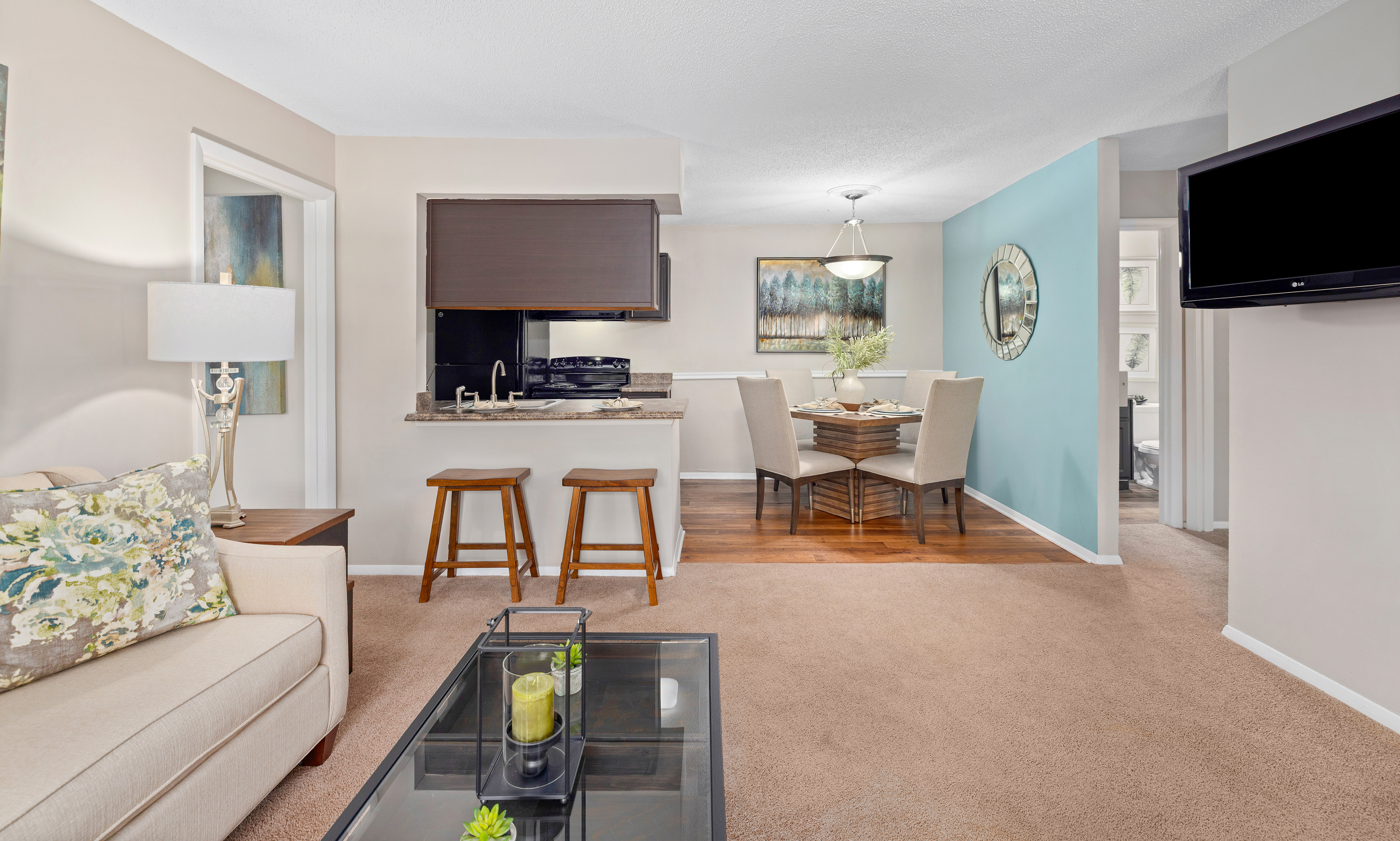 Model - Living room and kitchen  -  at MAA Westchase luxury apartment homes in Charleston, SC