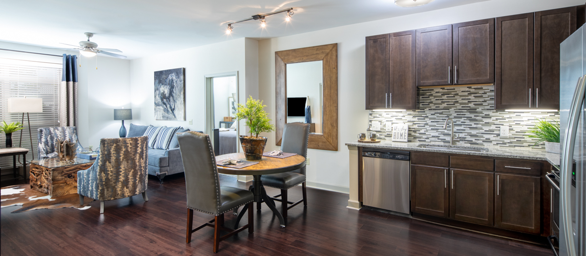 Model Kitchen & Living Room at MAA Charlotte Ave luxury apartment homes in Nashville, TN