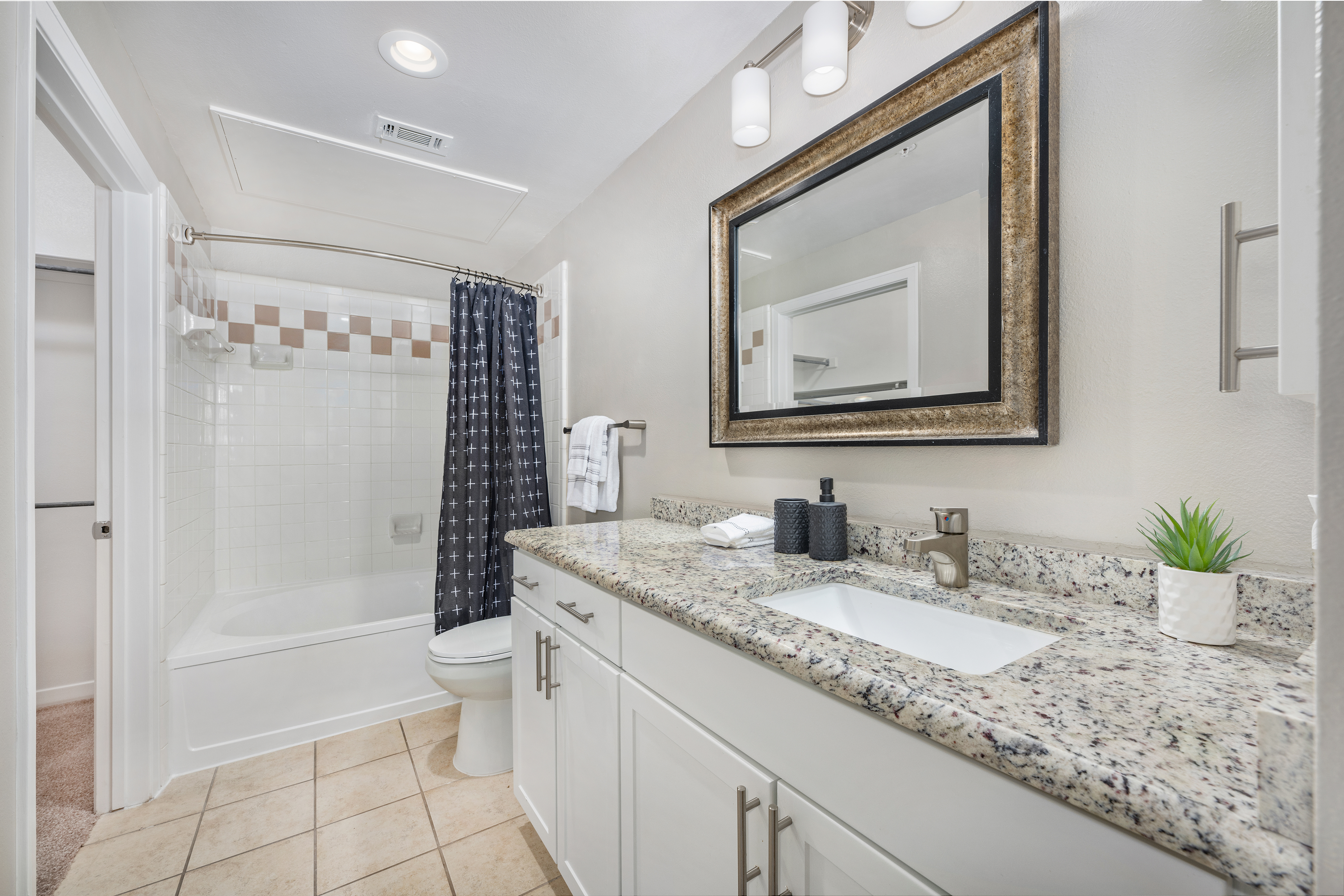 Bathroom at MAA Addison Circle luxury apartment homes in Addison, TX