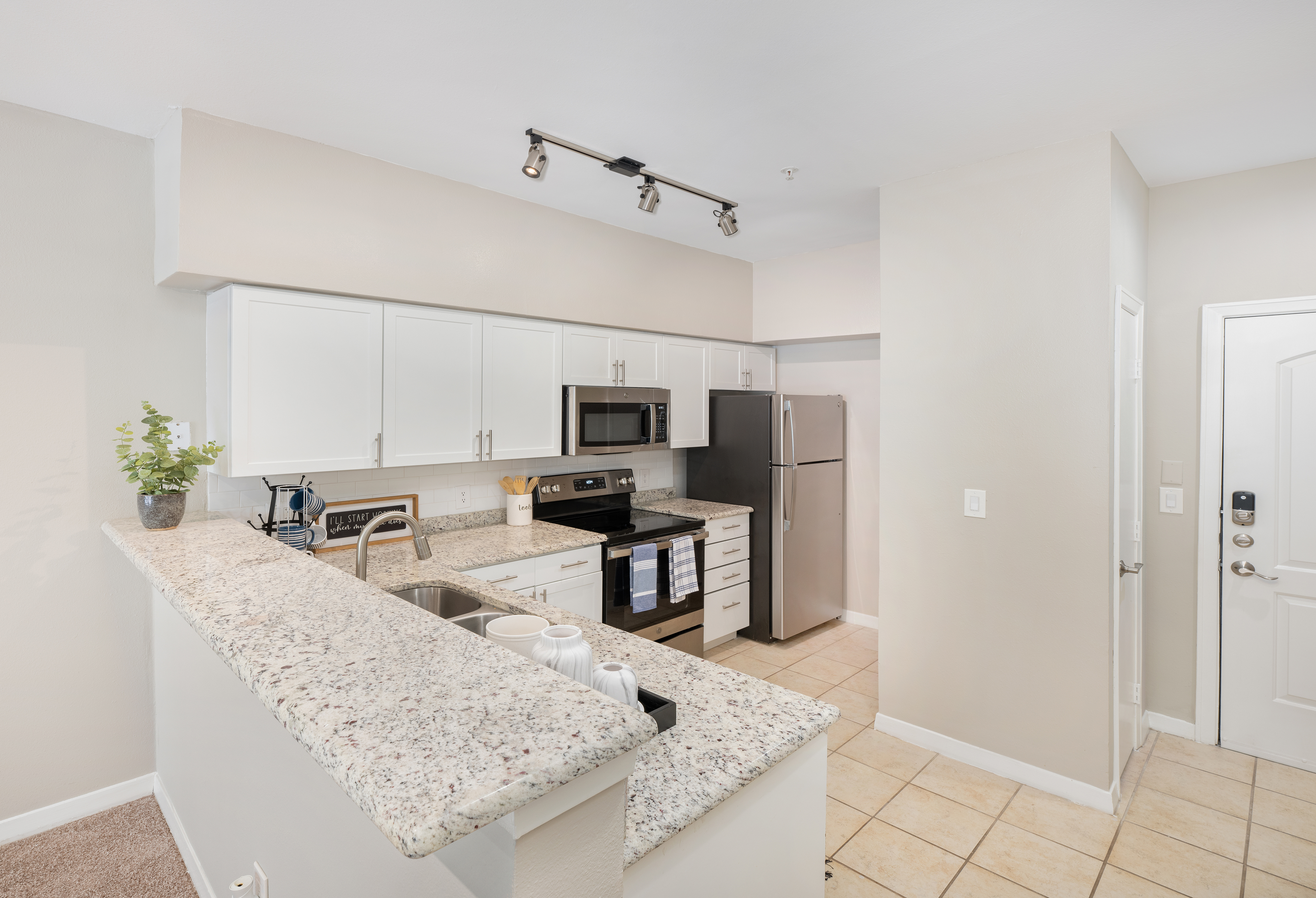 Kitchen at MAA Addison Circle luxury apartment homes in Addison, TX