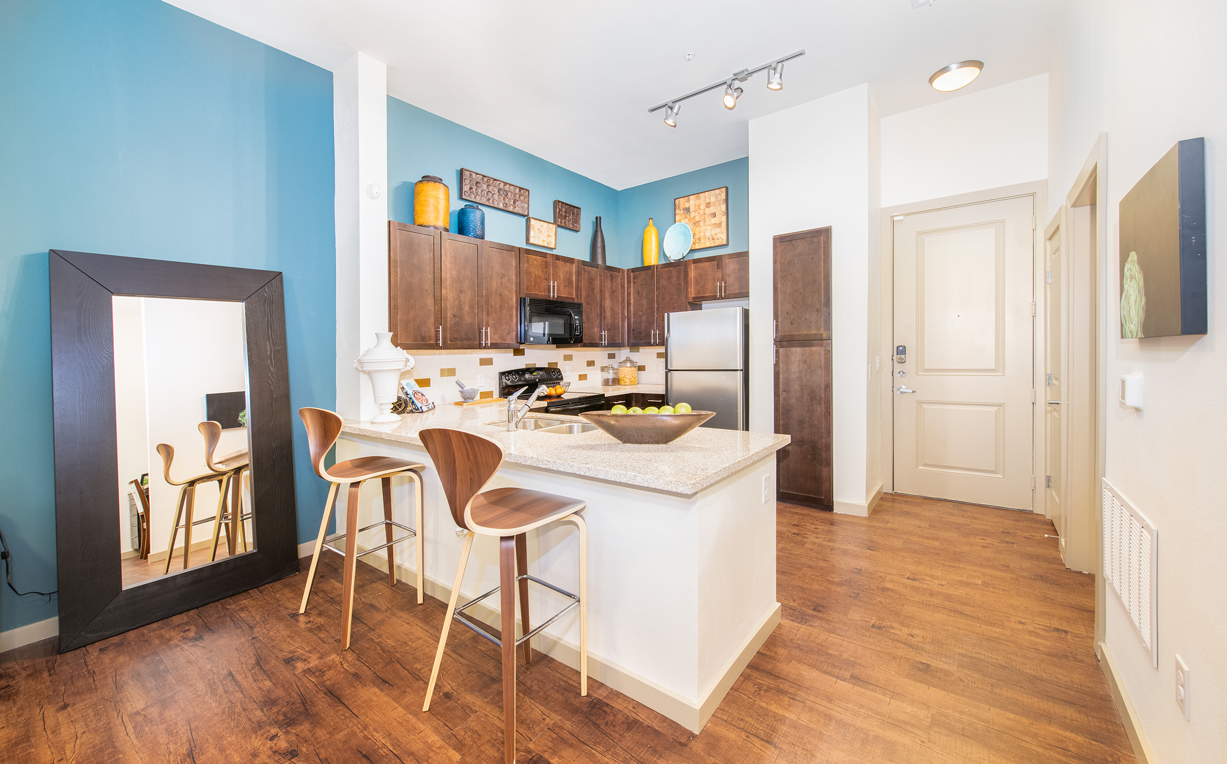 Kitchen and dining at MAA Frisco Bridges luxury apartment homes in Dallas, TX