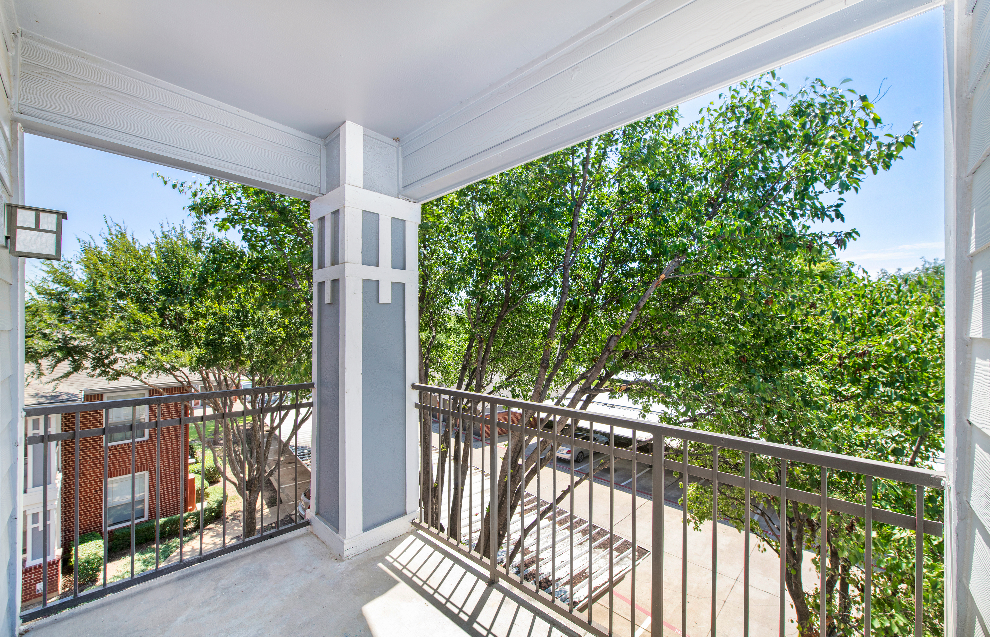 Balcony at MAA Grand Courtyards luxury apartment homes in Grand Prairie, TX