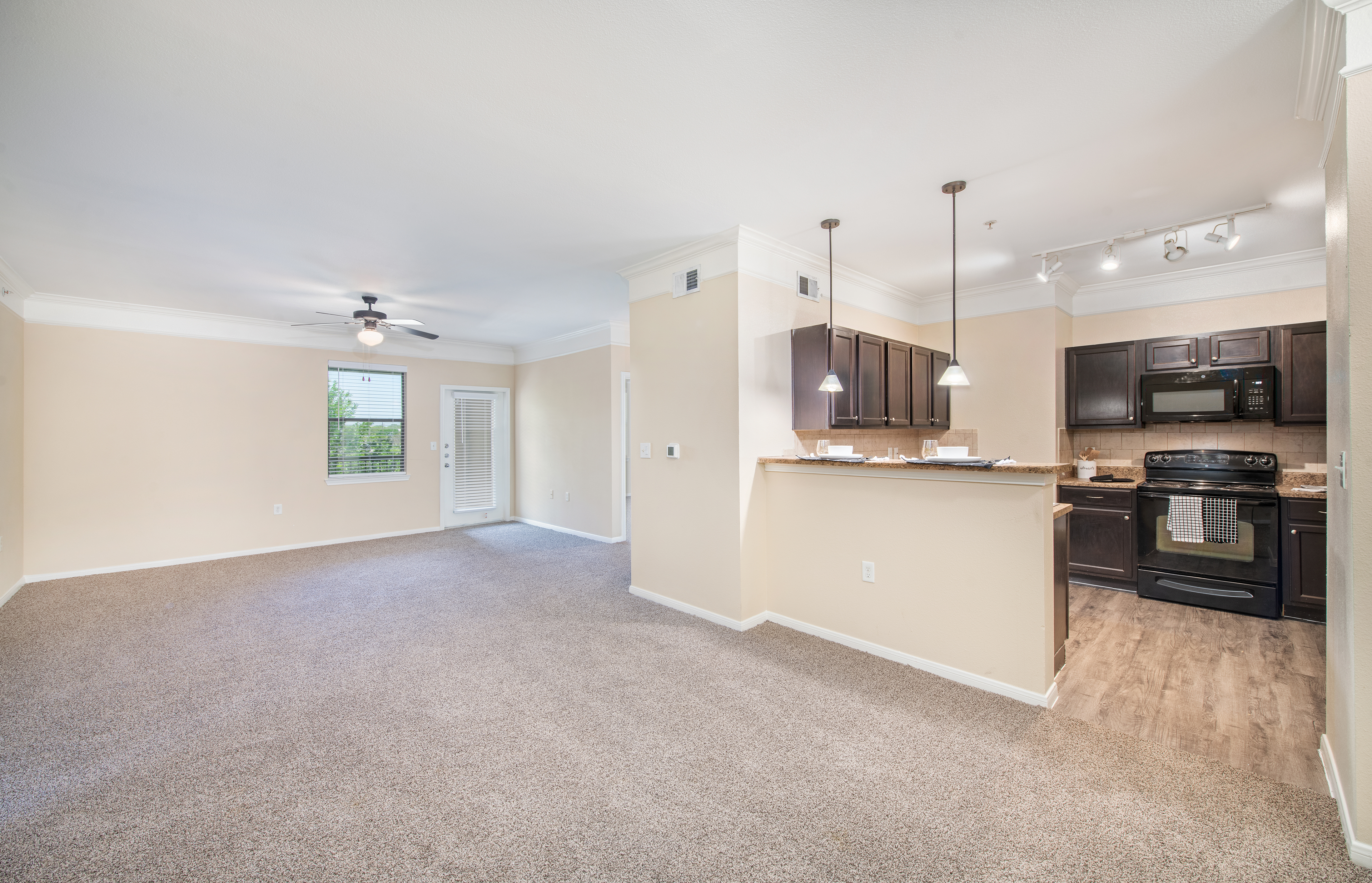 Living Room and Kitchen at MAA Hebron in Dallas, TX