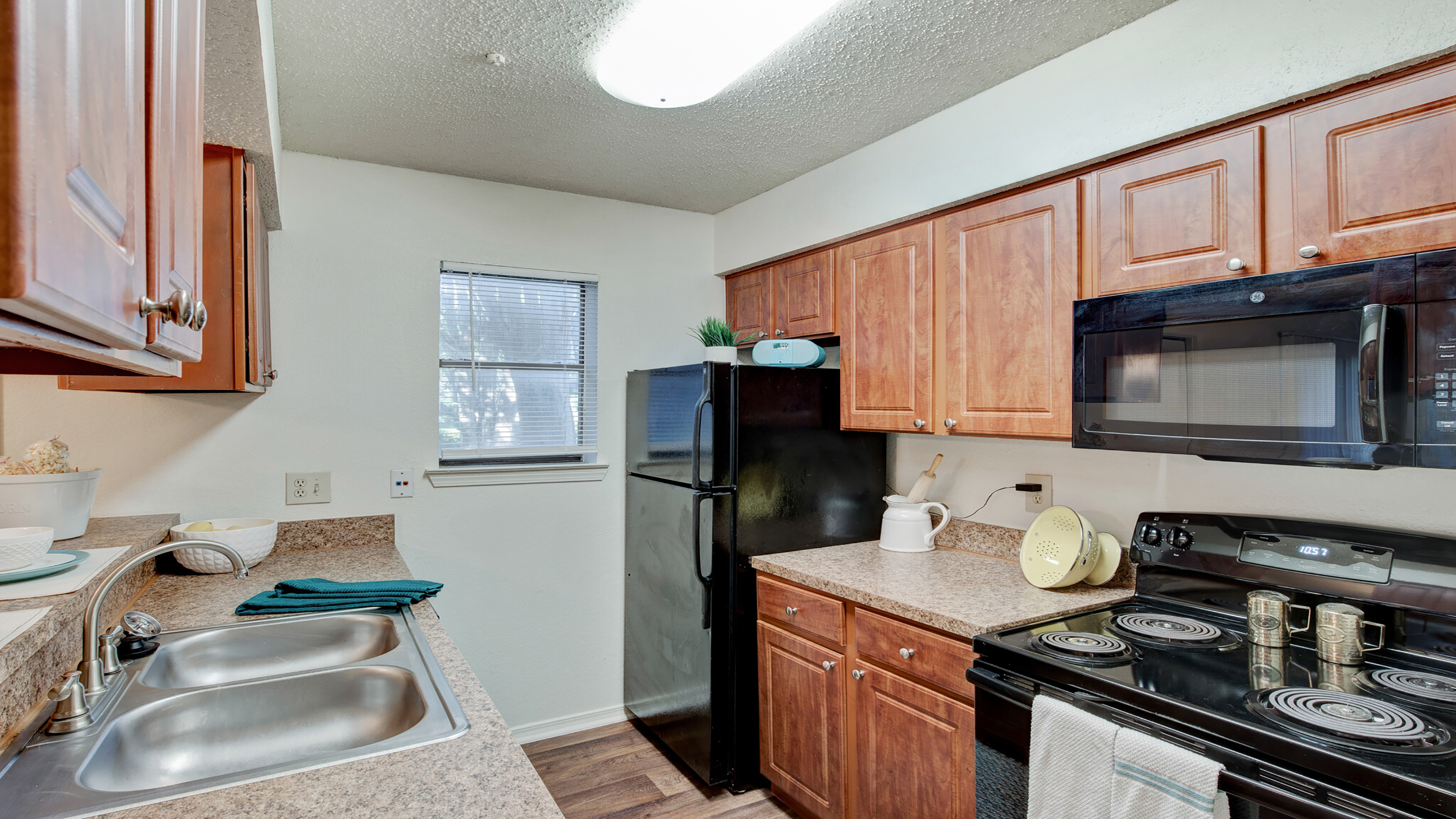 Kitchen at Courtyards at Campbell luxury apartment homes in Dallas, TX