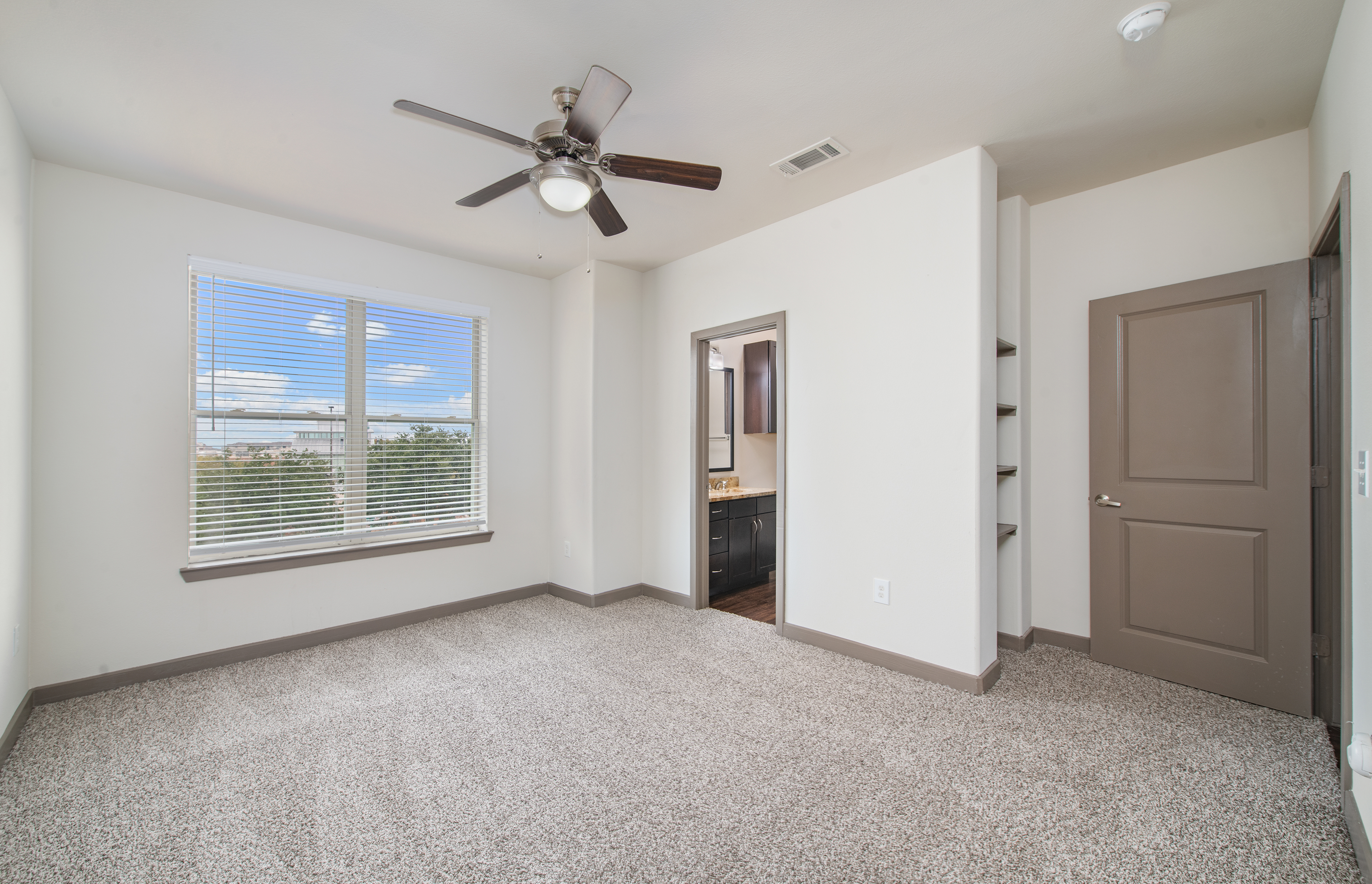 Bedroom at MAA Market Center luxury apartment homes in Plano, TX