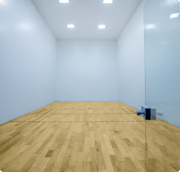 Modern community racquetball court with wood floors at MAA Valley Ranch luxury apartments in Irving, TX