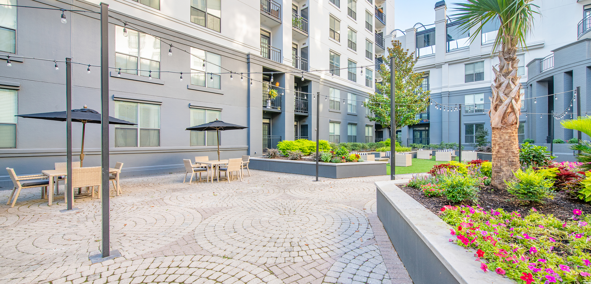 Courtyard walkway at MAA Worthington luxury apartment homes in Dallas, TX