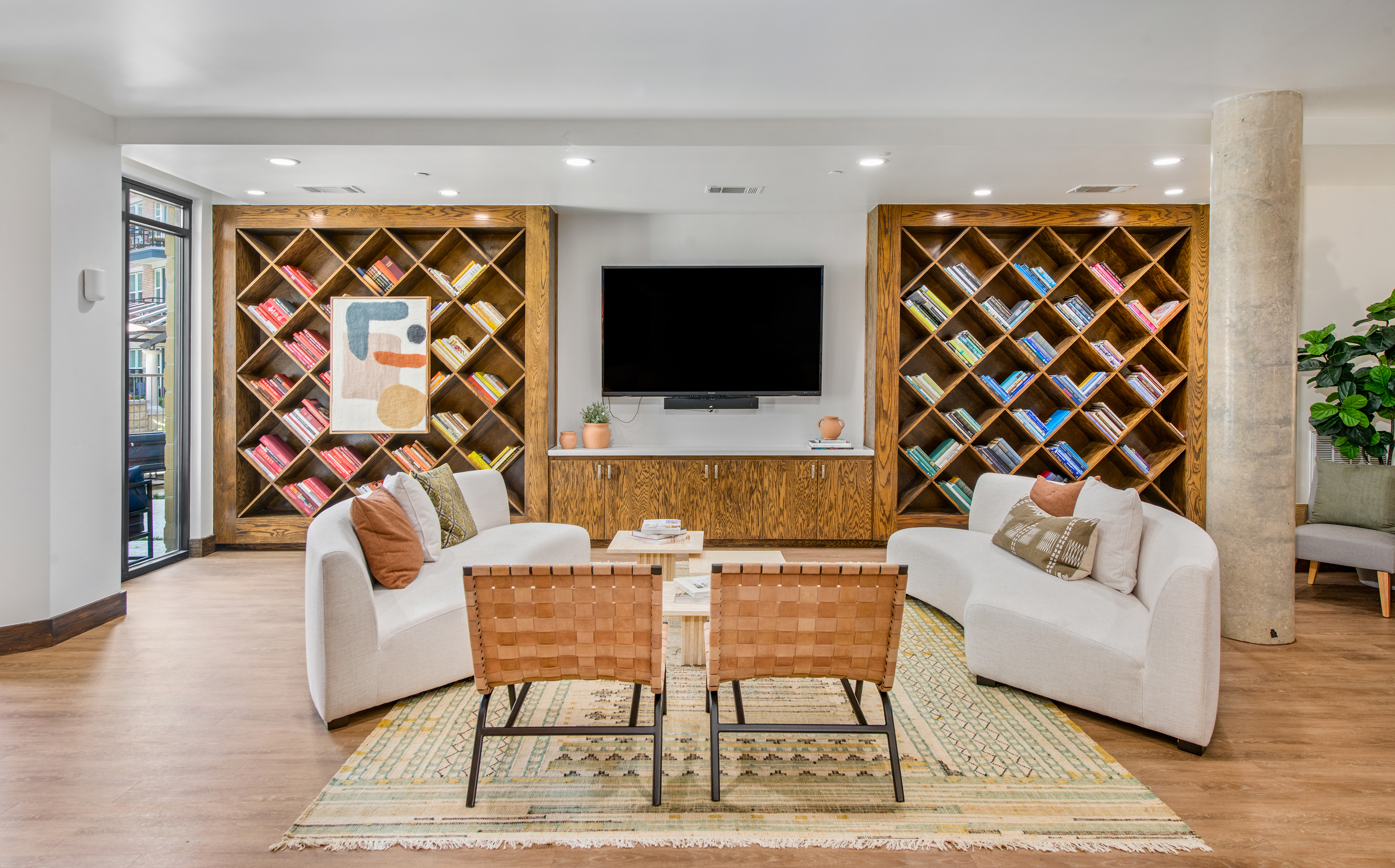 Clubhouse with Bookshelves at MAA 510 in Houston, TX