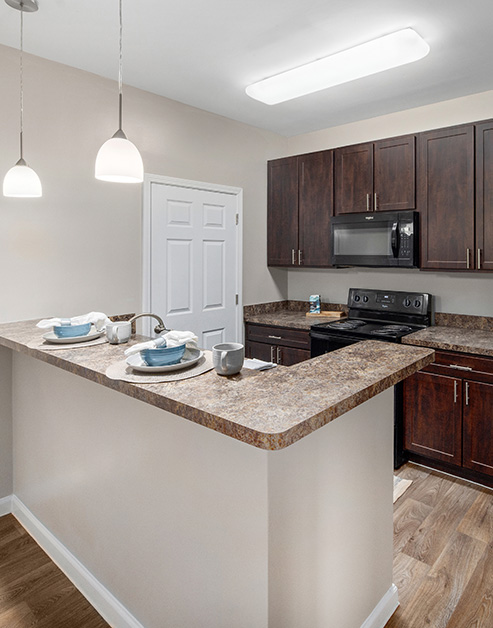 Kitchen at MAA Cypresswood luxury apartment homes in Spring, TX