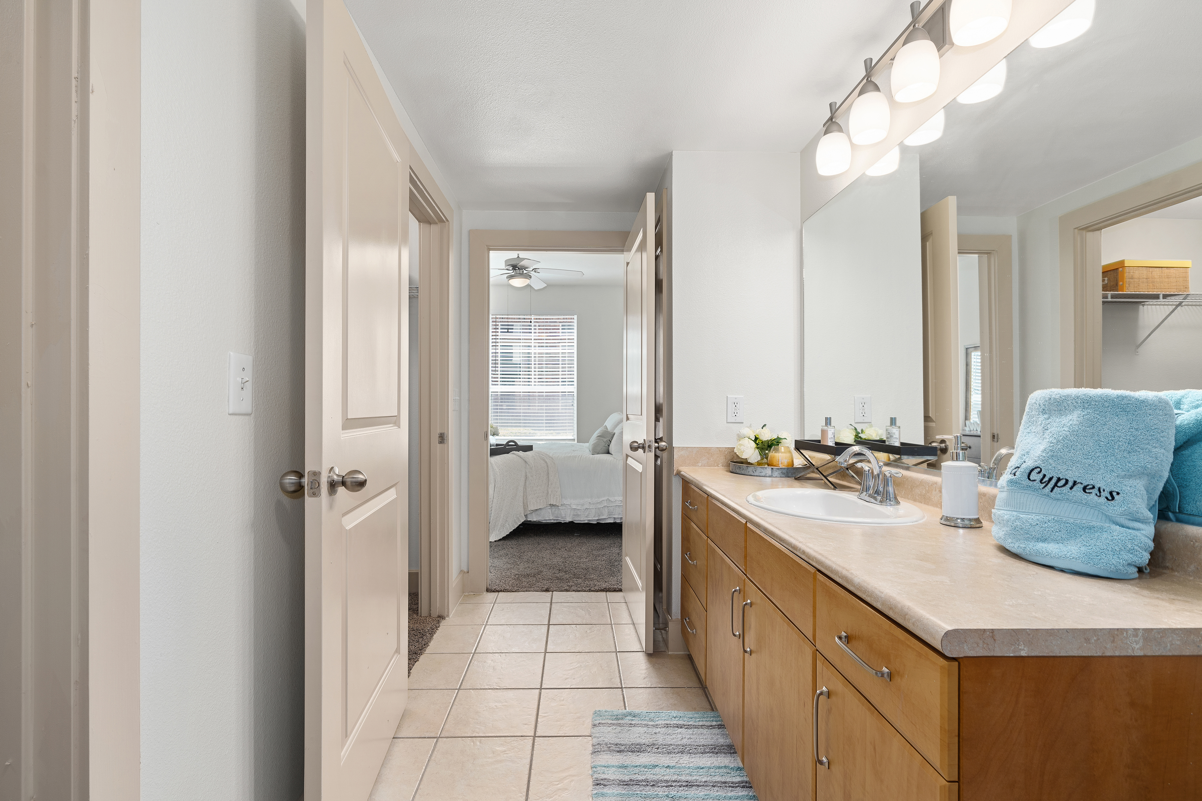 Bathroom at MAA Grand Cypress luxury apartment homes in Cypress, TX