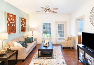 Living room at MAA Grand Cypress luxury apartment homes in Cypress, TX