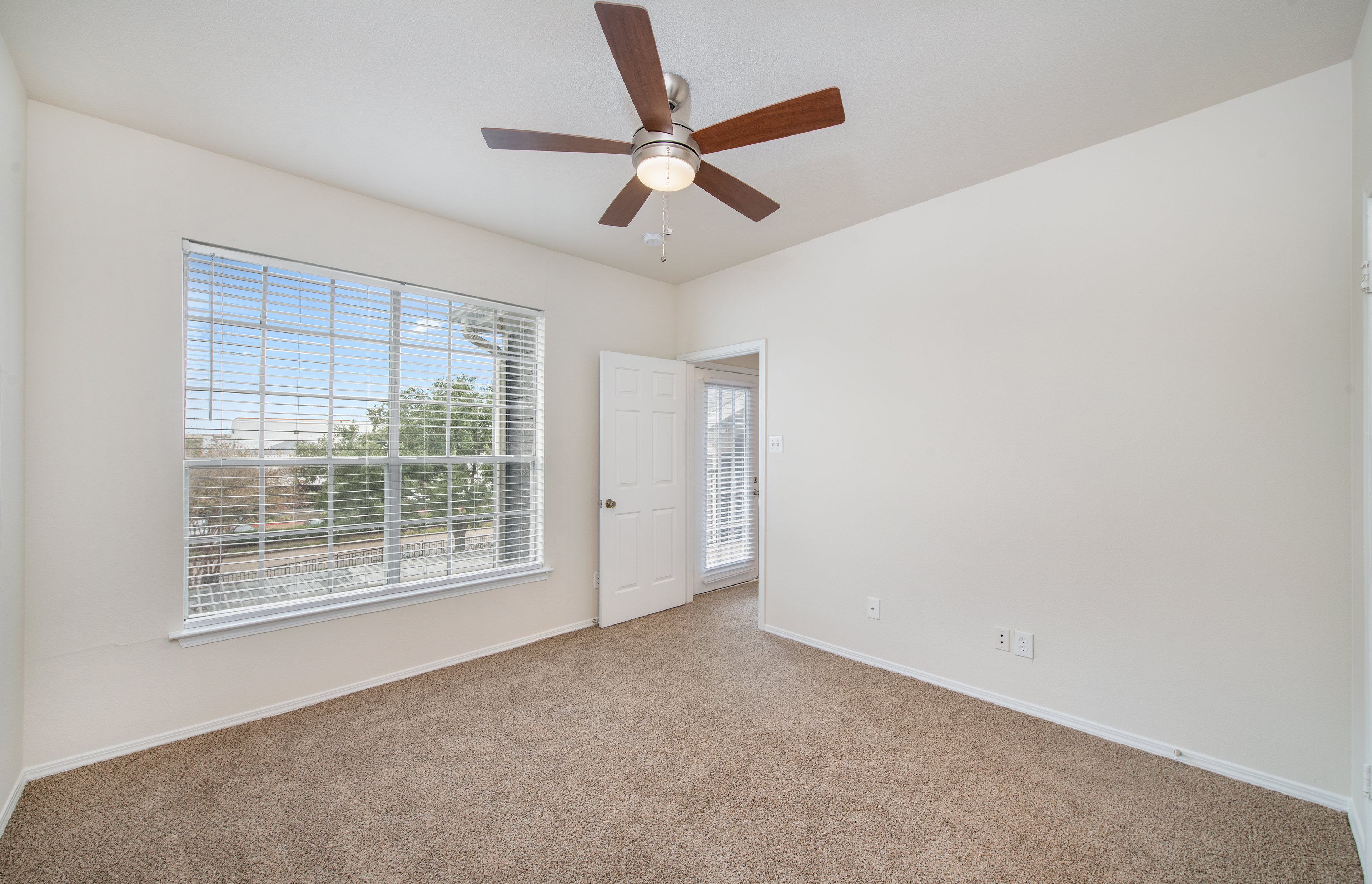 Bedroom at MAA Kirkwood luxury apartment homes in Stafford, TX